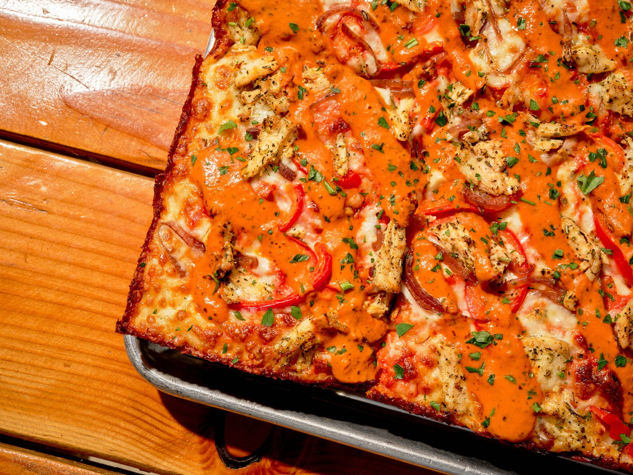 PRIME X BADMAASH BUTTER CHICKEN PIZZA