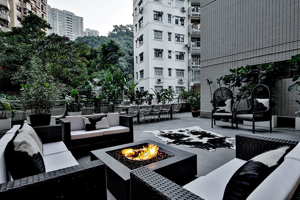 Hong Kong Interiors – Mid Levels outdoor patio design firepit black and white theme