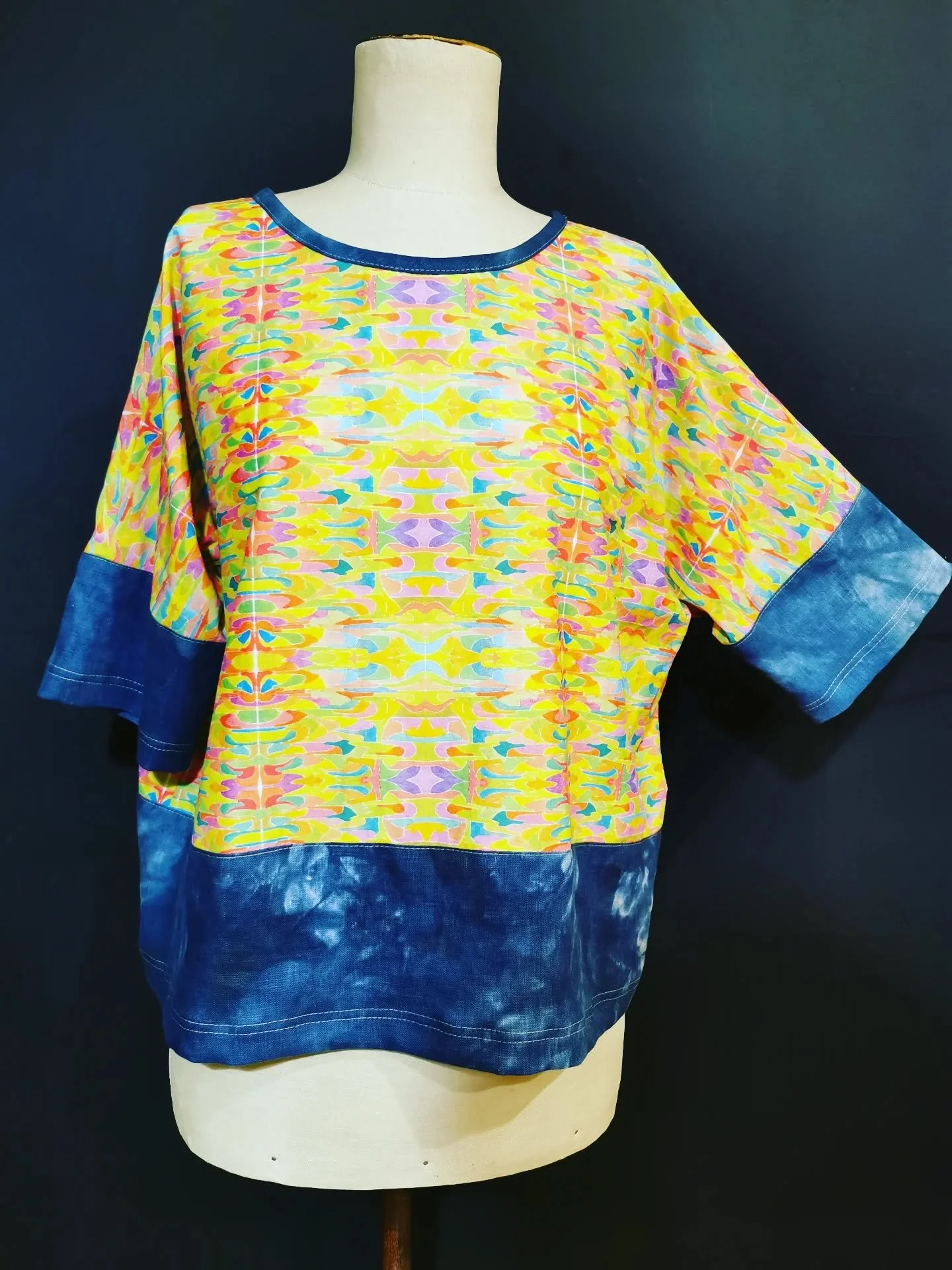 A truly original piece of clothing using my own fabric, designed from watercolours painted on paper then digitally printed on beautiful soft cotton lawn and teamed with a indigo handdyed linen.
As always mixing up patterns, prints and colours, and ev