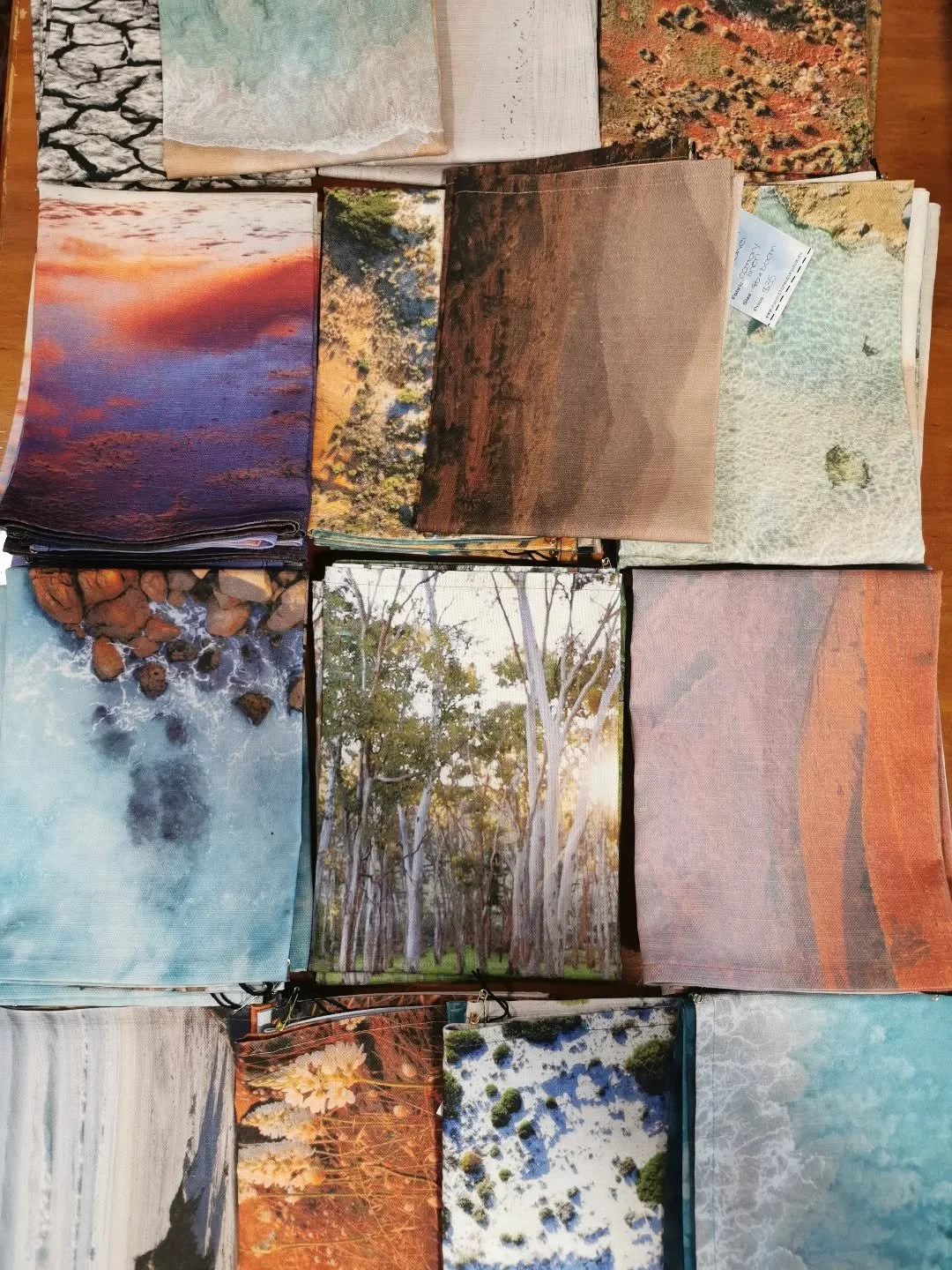 The fabric arrived from the printers on Saturday and I've managed to get all the teatowel orders cut and sewn - fractured shoulder is coping, just 😕 
As there are two images printed across the width of the fabric, there are some extra teatowels avai