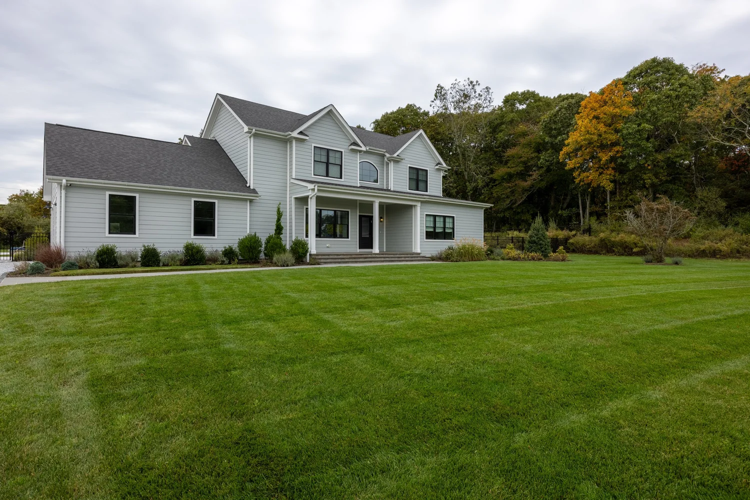 White Siding & Detached Garage — photograph 2