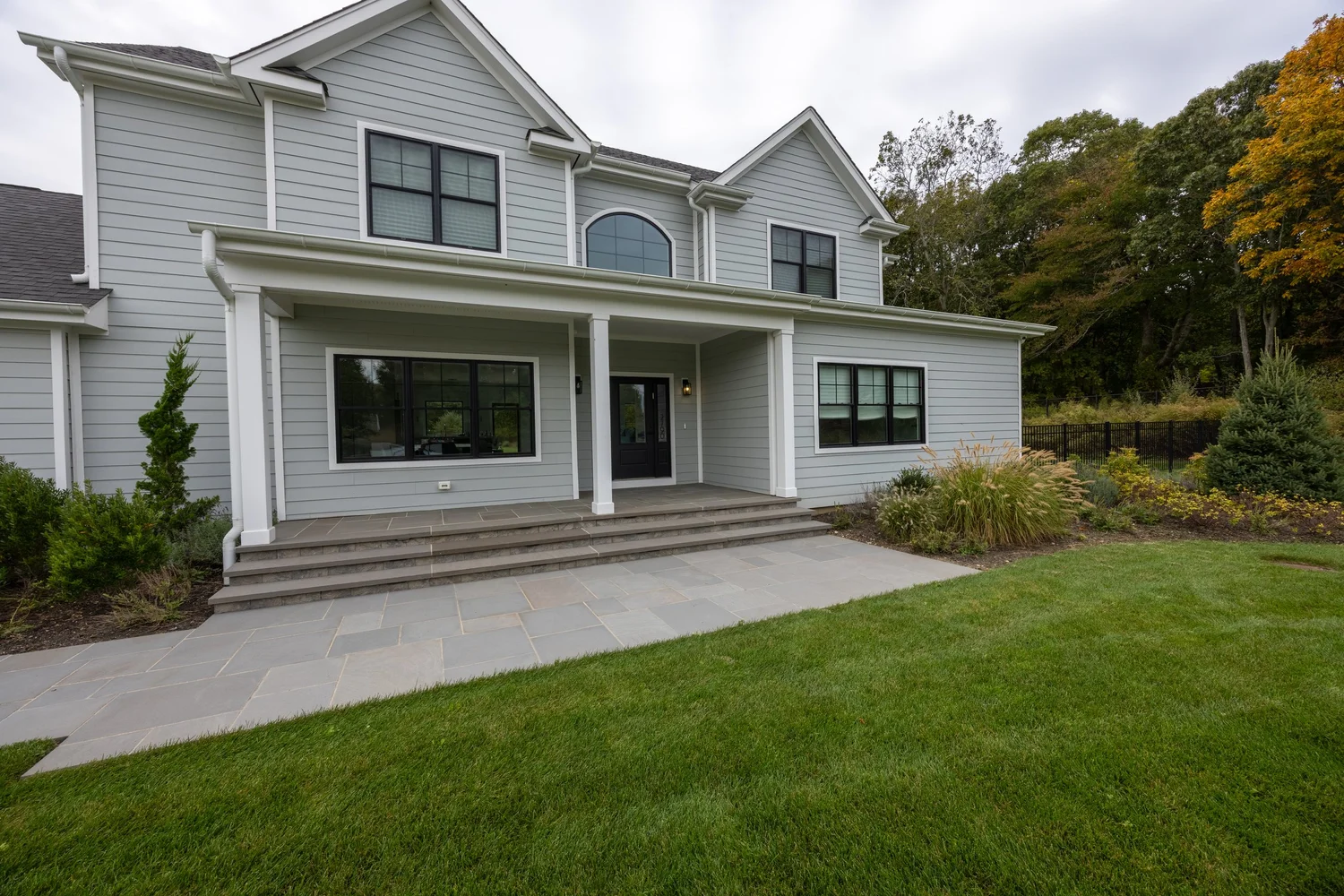 White Siding & Detached Garage — photograph 1