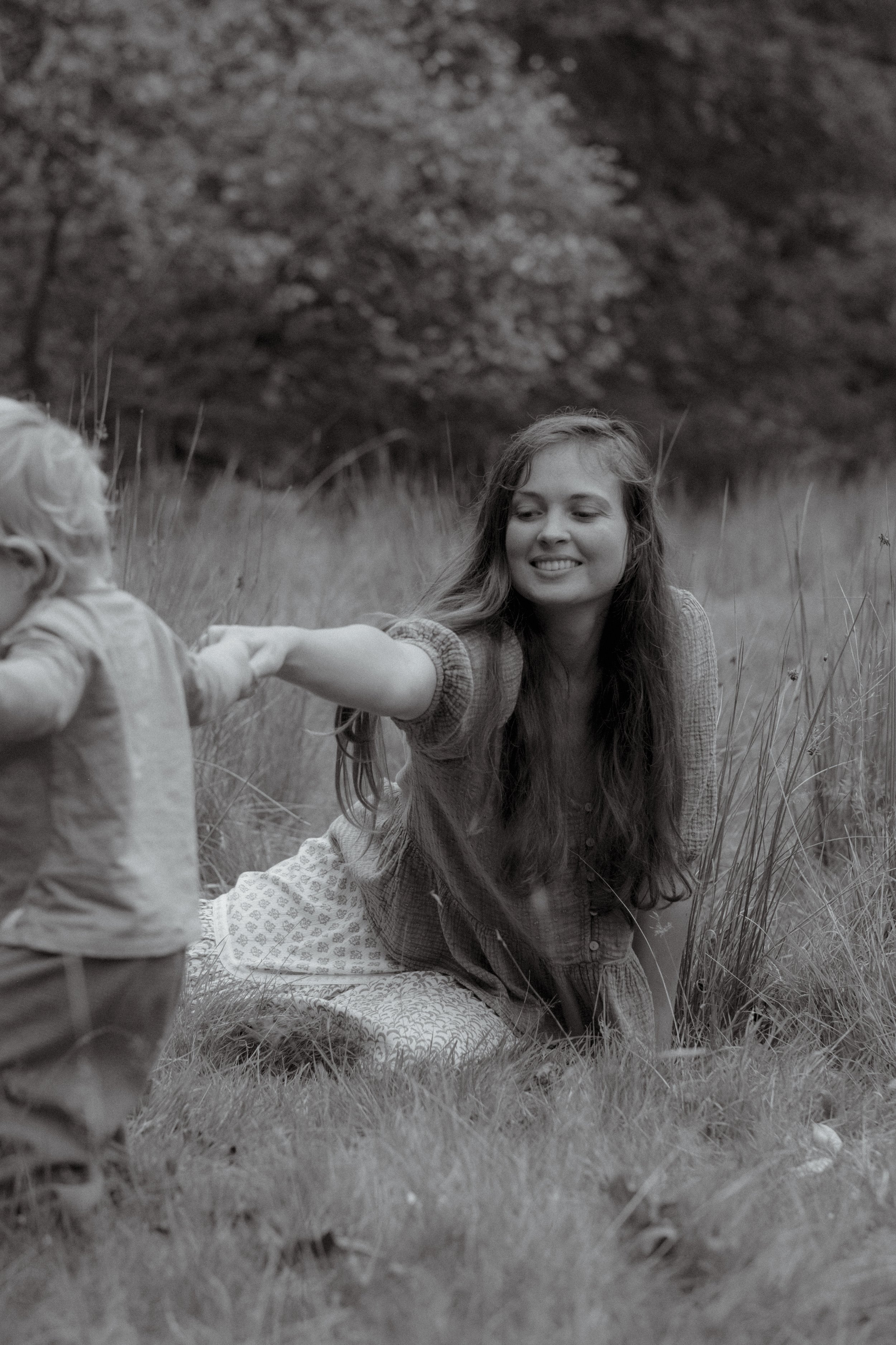 Mother and toddler during a relaxed, natural motherhood outdoor photoshoot in Wales
