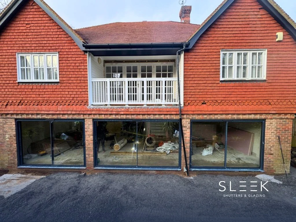 3 sets of Cortizo Cor Vision sliding doors with slim sight lines installed by Sleek Shutters and Glazing