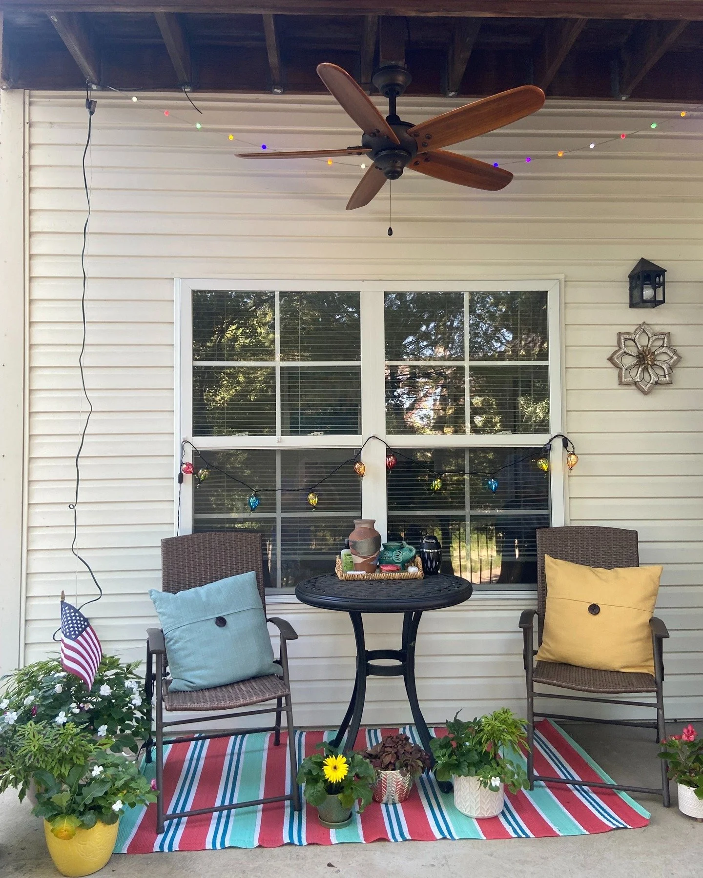 Our resident shared with us their summer patio bursting with color, where vibrant flowers spill from planters and glowing string lights cast a warm, cheerful glow. The space feels alive and inviting&mdash;perfect for relaxing evenings or lively gathe