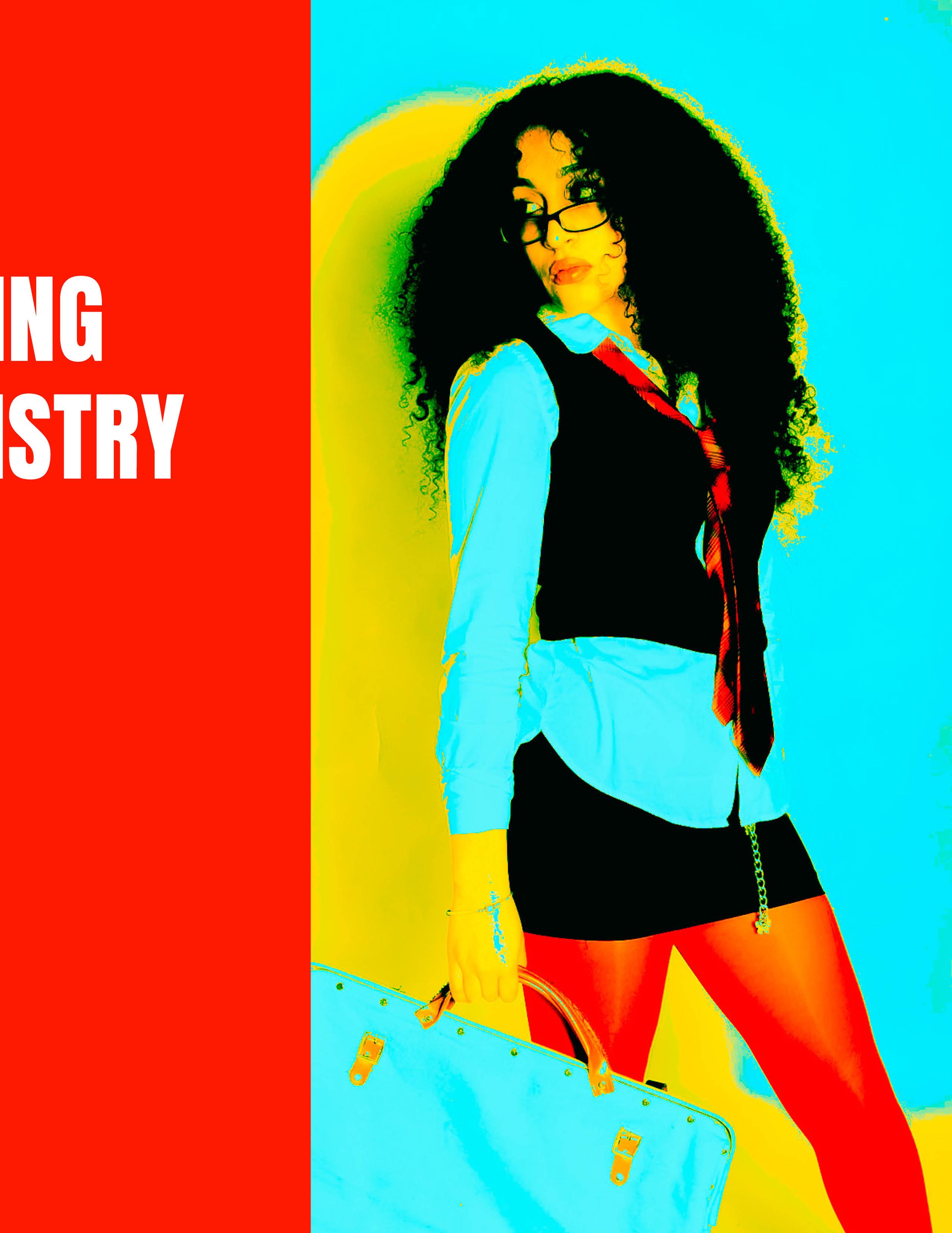 A woman with curly black hair, glasses, wearing a blue shirt under a black vest with a red and black tie, red tights, and holding a white handbag, standing against a bright colorful background with yellow, cyan, and blue hues.