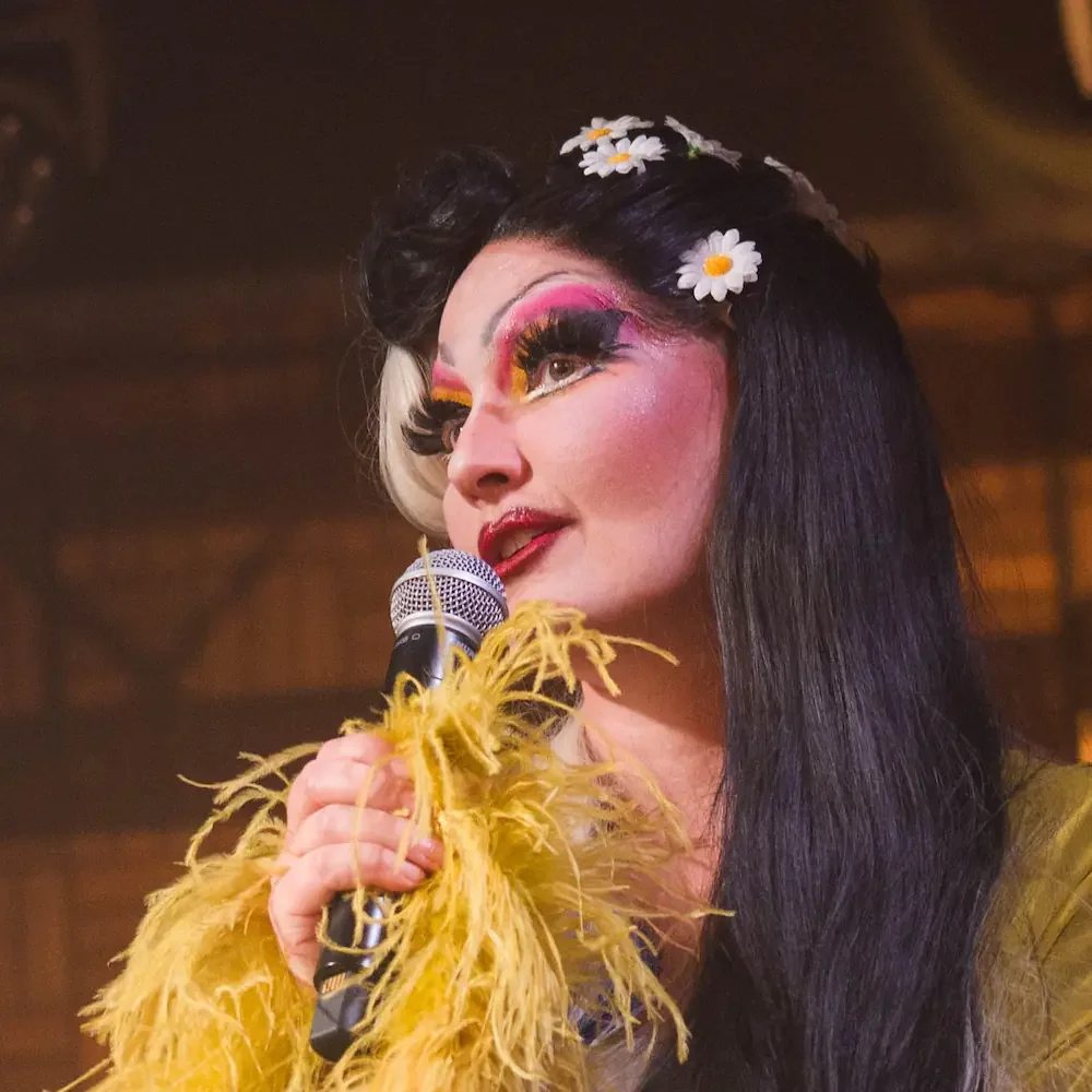 Pilot run participant on the stage presenting