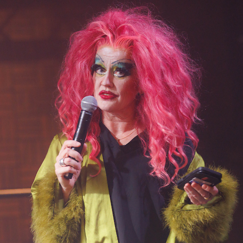 Executive coach transformed into a drag queen on the stage