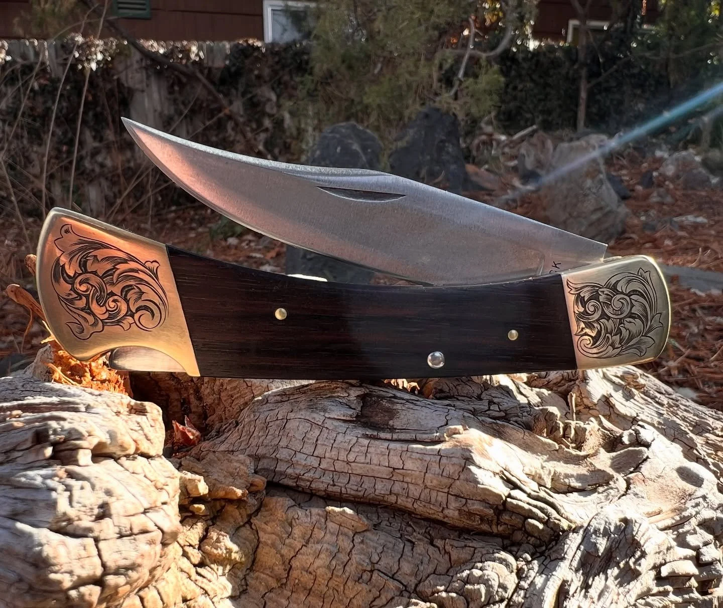 Grandad&rsquo;s Buck folder. Engraving has come as a natural progression from leather tooling and I love both mediums for different reasons. I am excited to see where both are headed this spring. #engraving #knifeengraving #knife #handengraved #handm