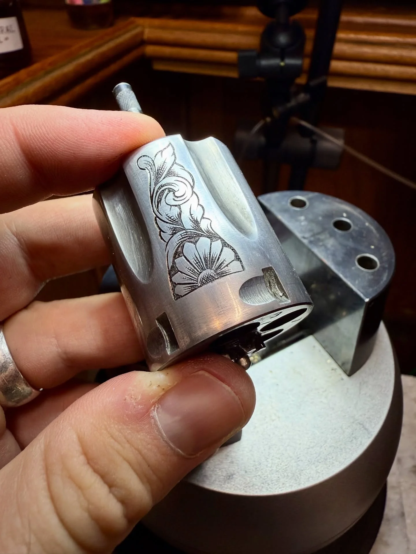 First cuts on this .38 cylinder. I&rsquo;ve read plenty of stories about how tricky these hardened parts can be to work on but this one cuts like a dream. #engraving #handengraving #idaho #boise #westernart #westerncraft #handmade #wip #tattoo #custo
