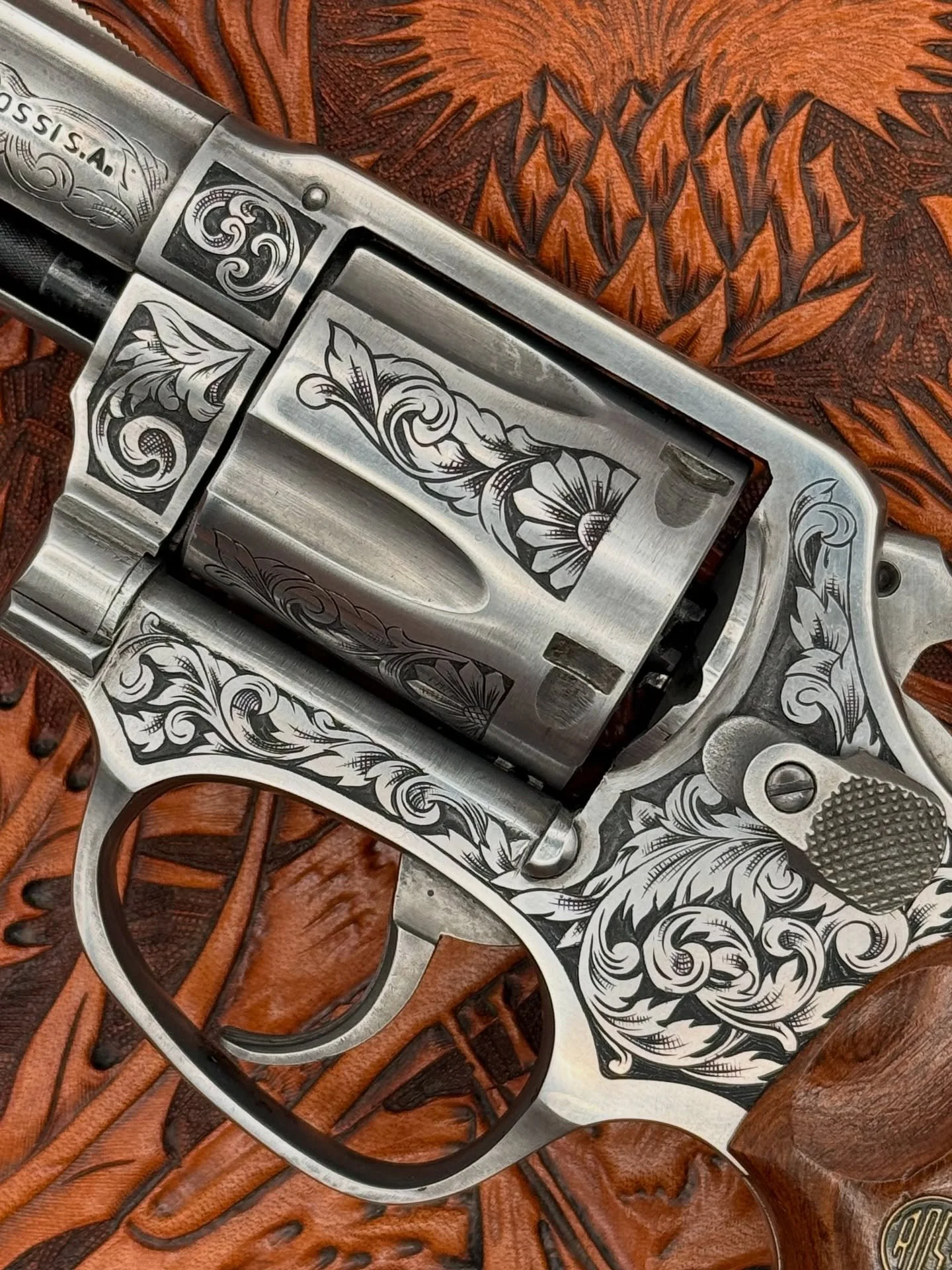 One side of the 38 project I&rsquo;ve been working on over the winter. The learning curve is steep on all those rounded surfaces, but we persist. Not for sale. #handengraving #engraving #fega