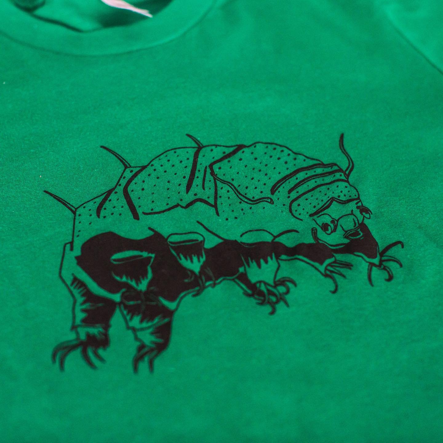 A throwback to one of the first designs I drew and printed in my Curious Chiton collection&hellip;presenting The Tardigrade! I&rsquo;m a big fan of @ologies and I just listened to the episode about Tardigradology. Swooon! ❤️❤️ Dr. Paul Bartels discus