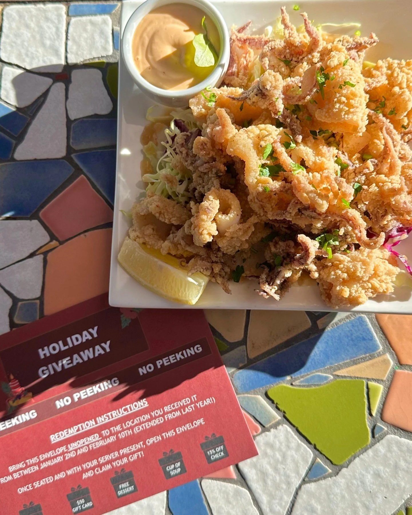 Red envelope redemption is here 🧧 Yours could reveal a free appetizer, perfect for guest favorites like our crispy calamari. Join us and see what&rsquo;s inside!