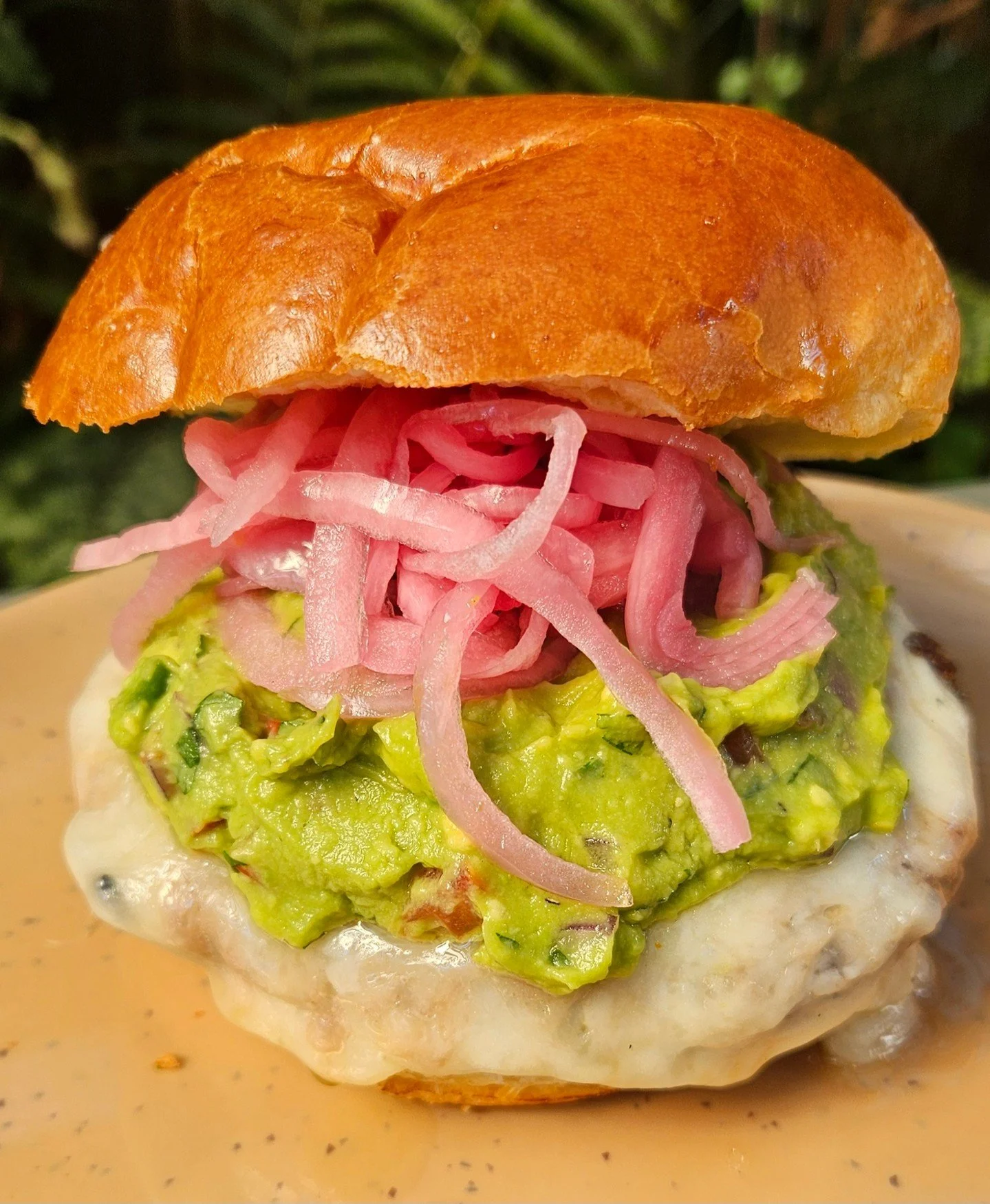 Come hungry, Burger Tuesday is here! Tonight's Hamburgesa features a Hearst Ranch 100% grass-fed patty with bacon and caramelized onions, topped with house-made guacamole, pickled onions, and white cheddar on a buttery brioche bun. 🍔
