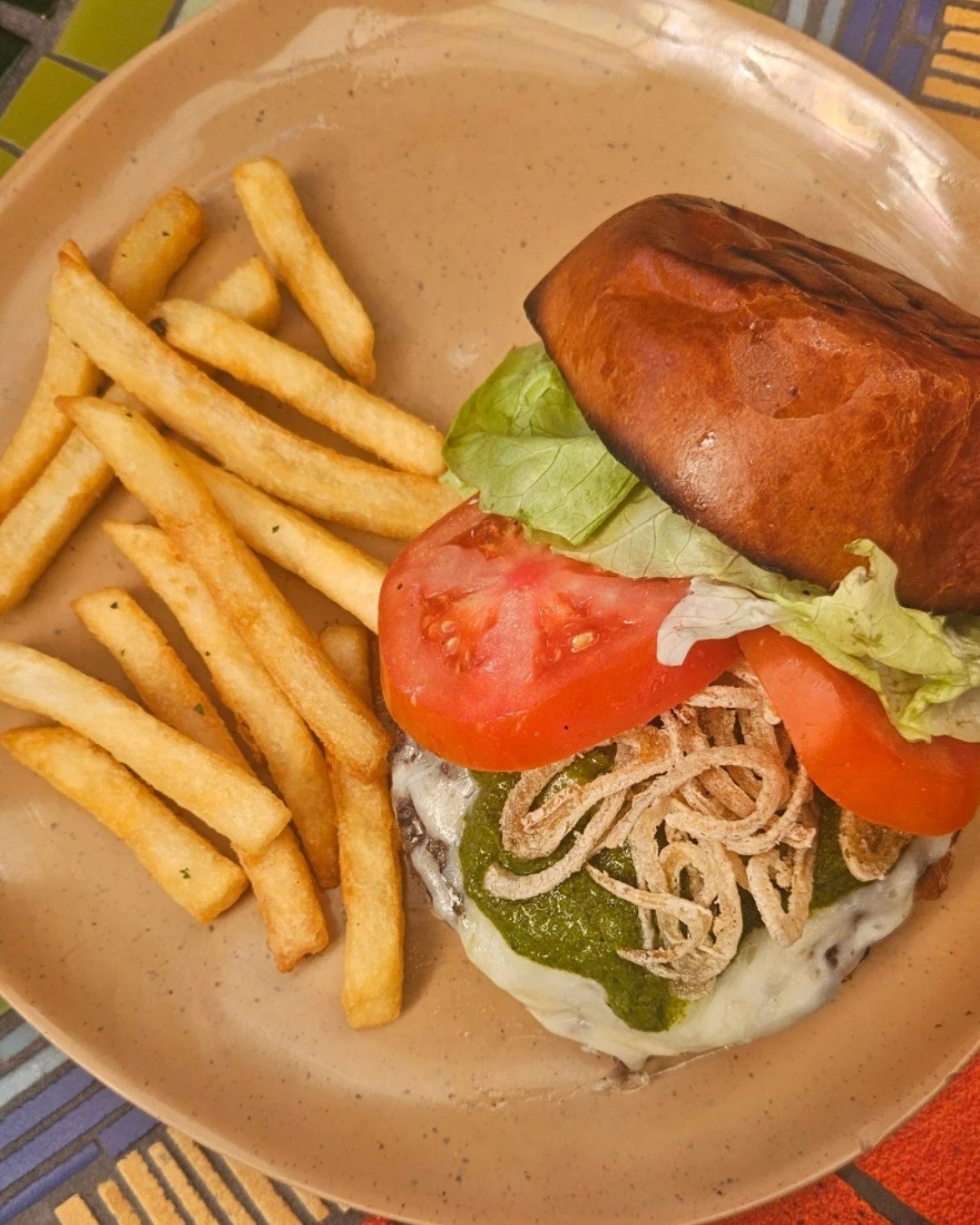 Join us tomorrow night for Burger Tuesday! Enjoy a Chimichurri Burger stacked with Hearst Ranch grass-fed beef, melted white cheddar, fresh greens, and crispy onion straws, finished with chimichurri and aioli on a buttery brioche bun. A classic done 