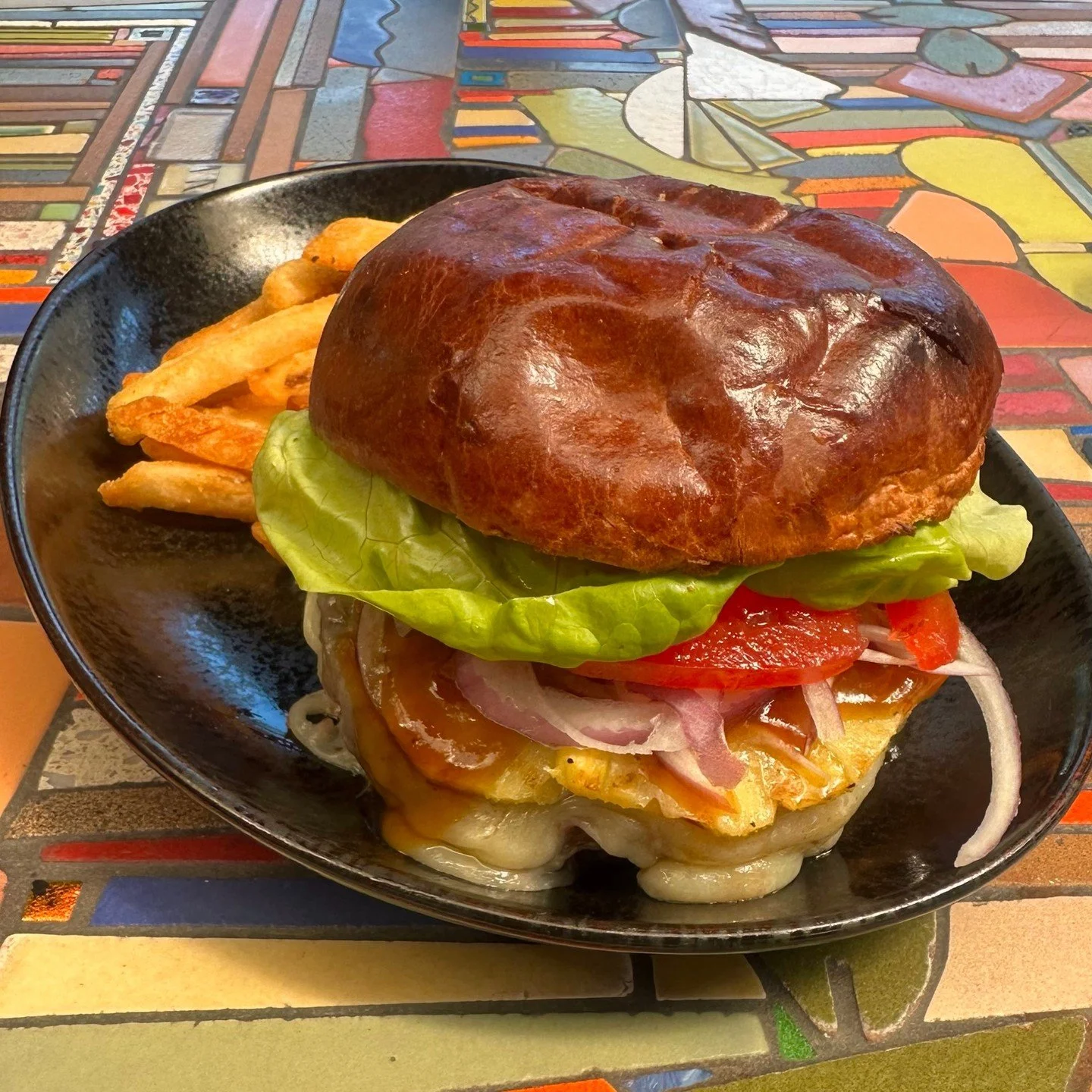 Join us in the garden tonight for Burger Tuesday! Tonight, we'll be serving our Teriyaki Burger, made with Hearst Ranch 100% grass fed patty, pineapple, white cheddar, lettuce, tomato, onion, sambal aioli, and teriyaki sauce served on a brioche bun.