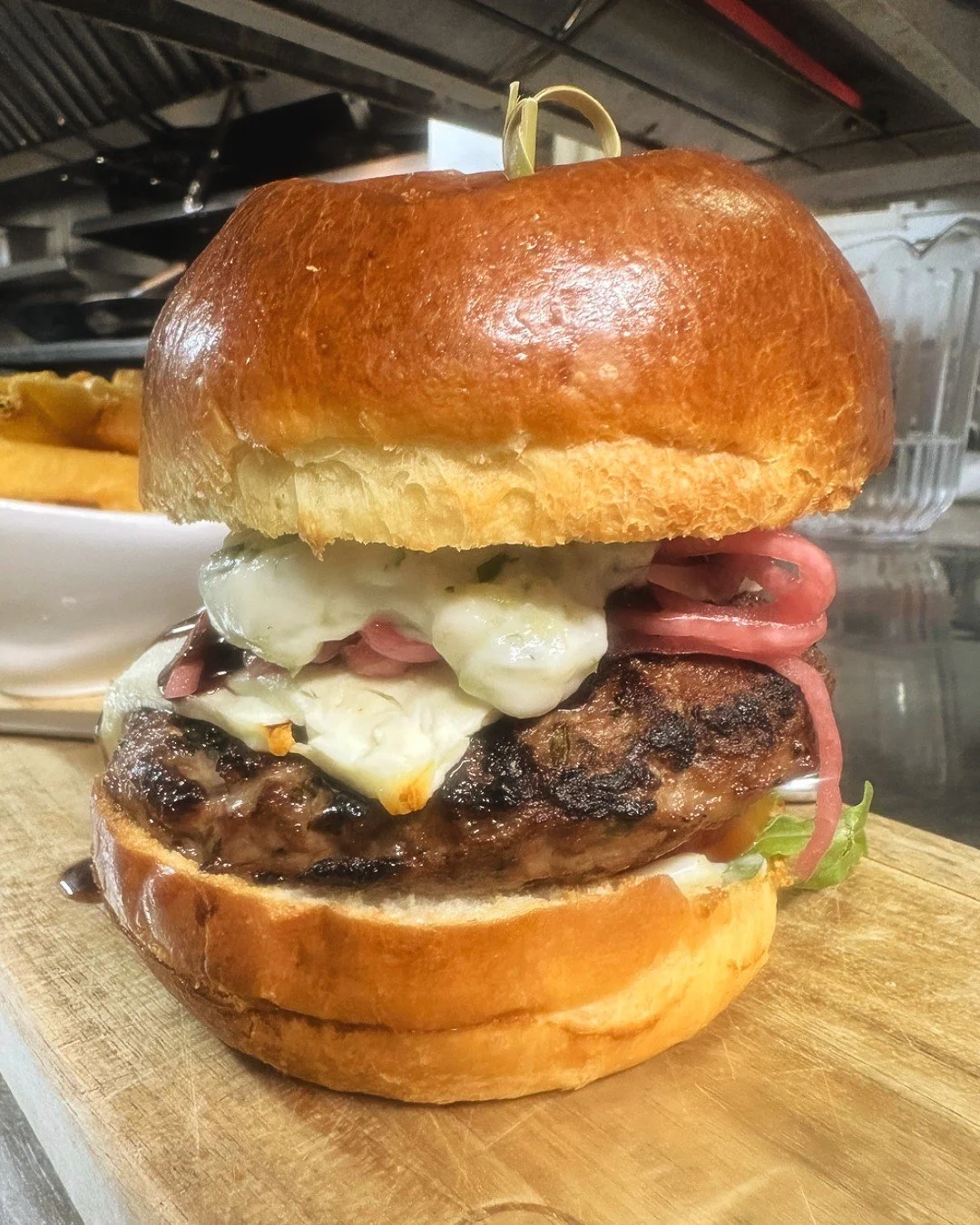 Kick off your week with us tomorrow night for Burger Tuesday! We'll be serving a specialty Greek Lamb Burger made with a New Zealand lamb patty, vine ripe tomato, feta cheese, pickled onions, bay arugula, balsamic drizzle on a brioche bun. Gluten fre
