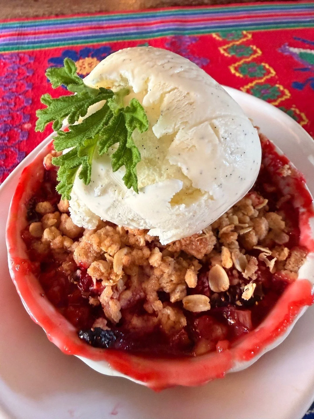 New on the dessert menu: Strawberry Rhubarb Crisp, served warm with a scoop of McConnell&rsquo;s French vanilla ice cream. Made with local strawberries and just the right hint of tartness 🍓