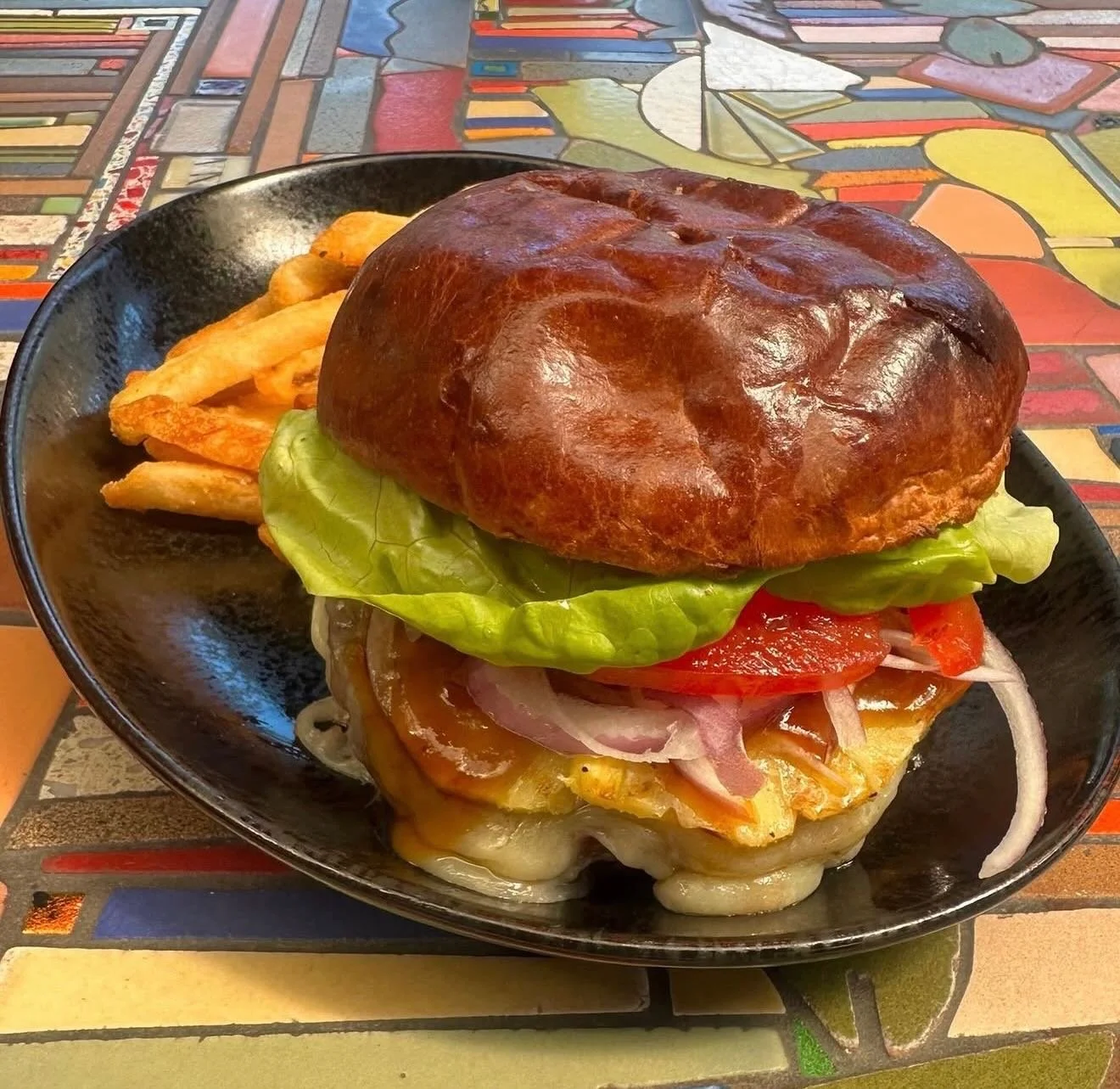 Join us in the garden for Burger Tuesday! Tonight we'll be serving our specialty Hawaiian Burger made a Hearst Ranch 100% grass-fed beef patty, bacon, pineapple, white cheddar, Teriyaki sauce, lettuce, tomato and aioli on a brioche bun.