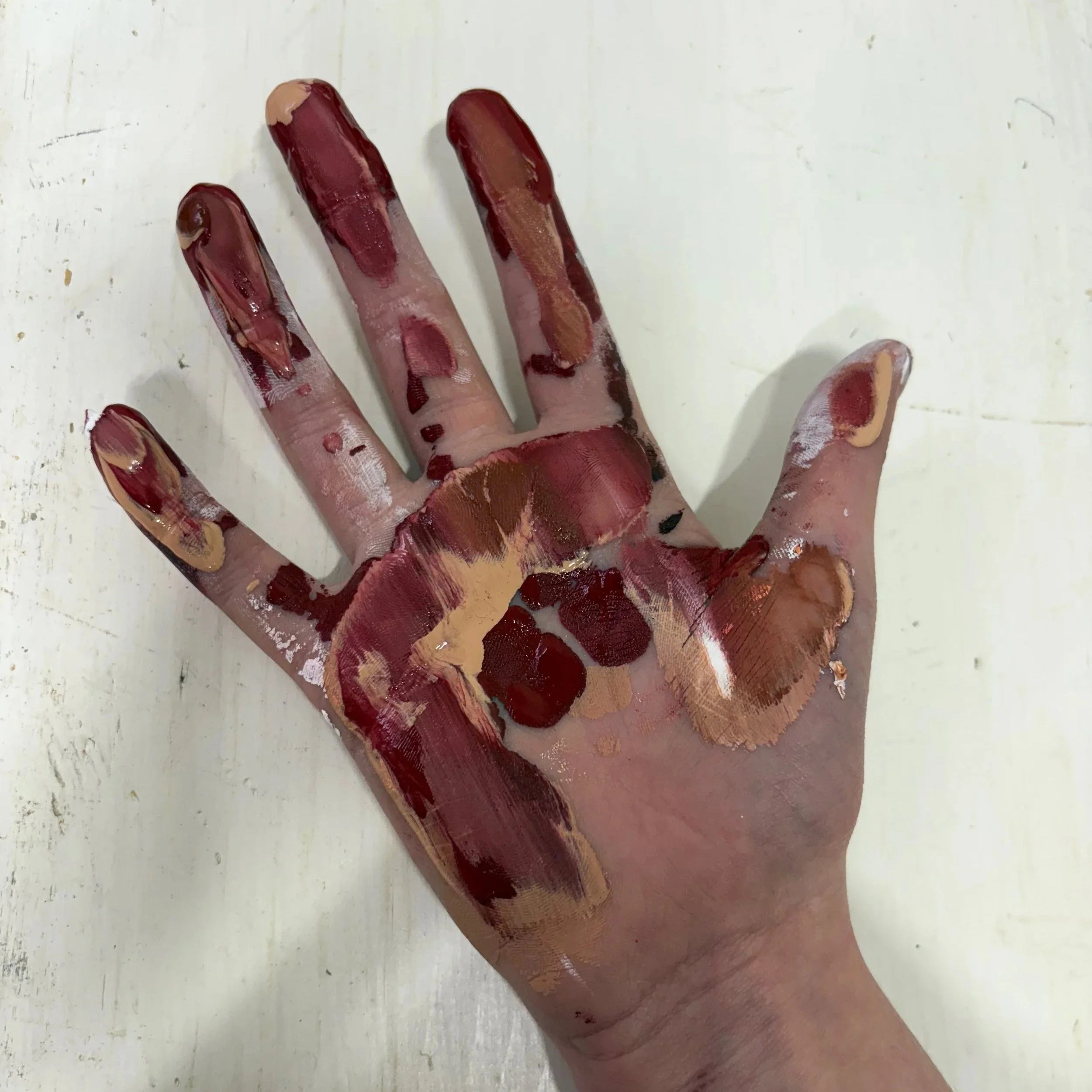 Painted hand, with the text 'Visual Art: Tween Freestyle' in white font at the top.