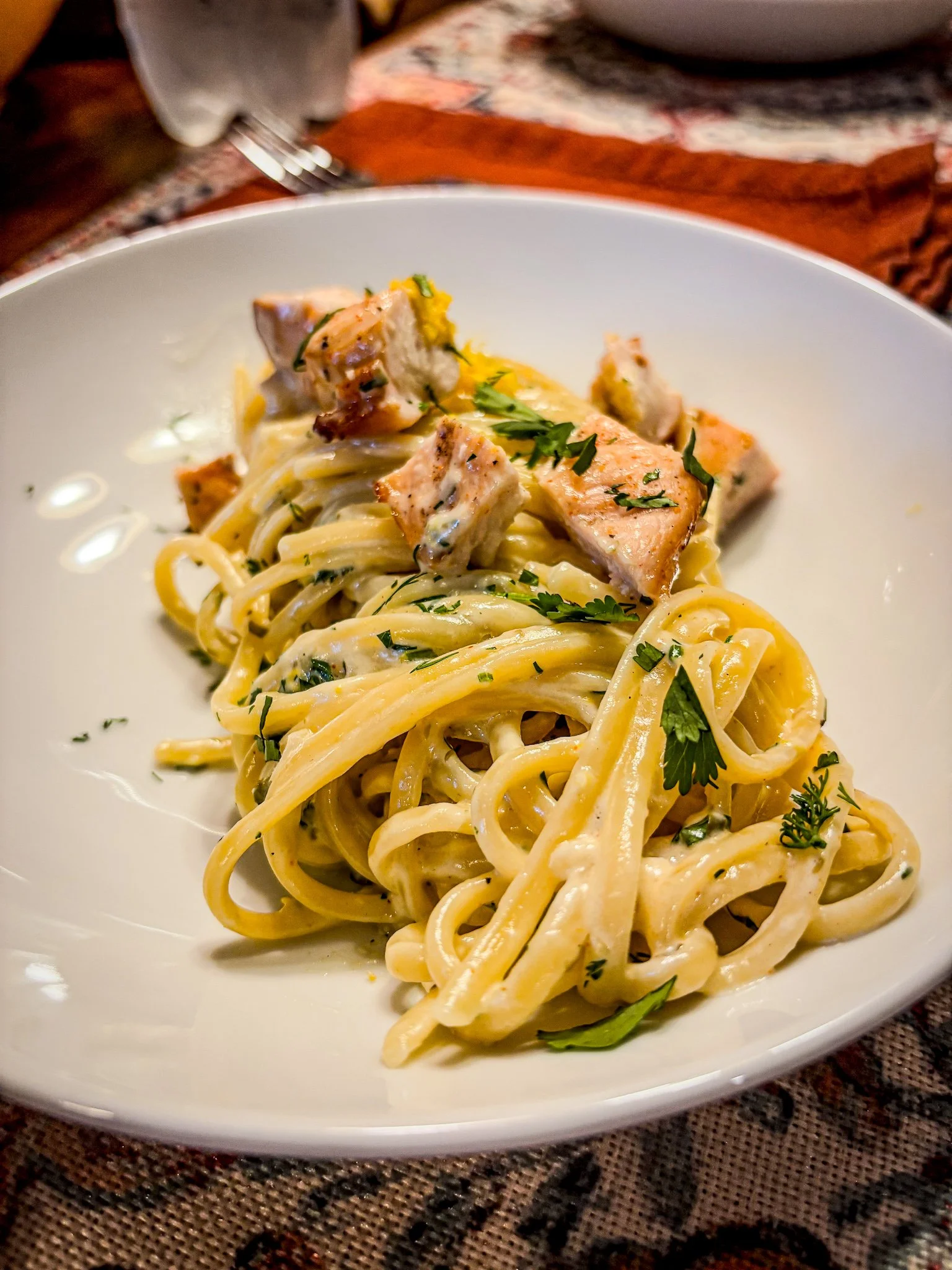 Smoked chicken w/ Lemon Cilantro cream sauce over linguine pasta