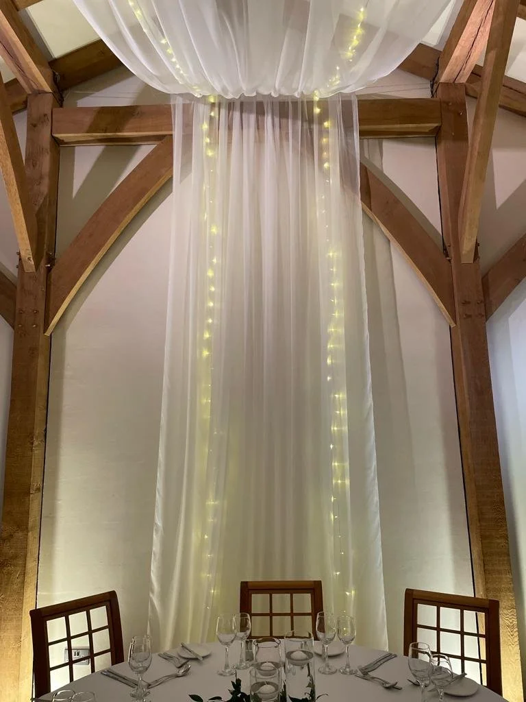 Rose Gold Drapes and Lights Oak Barn 1.JPG
