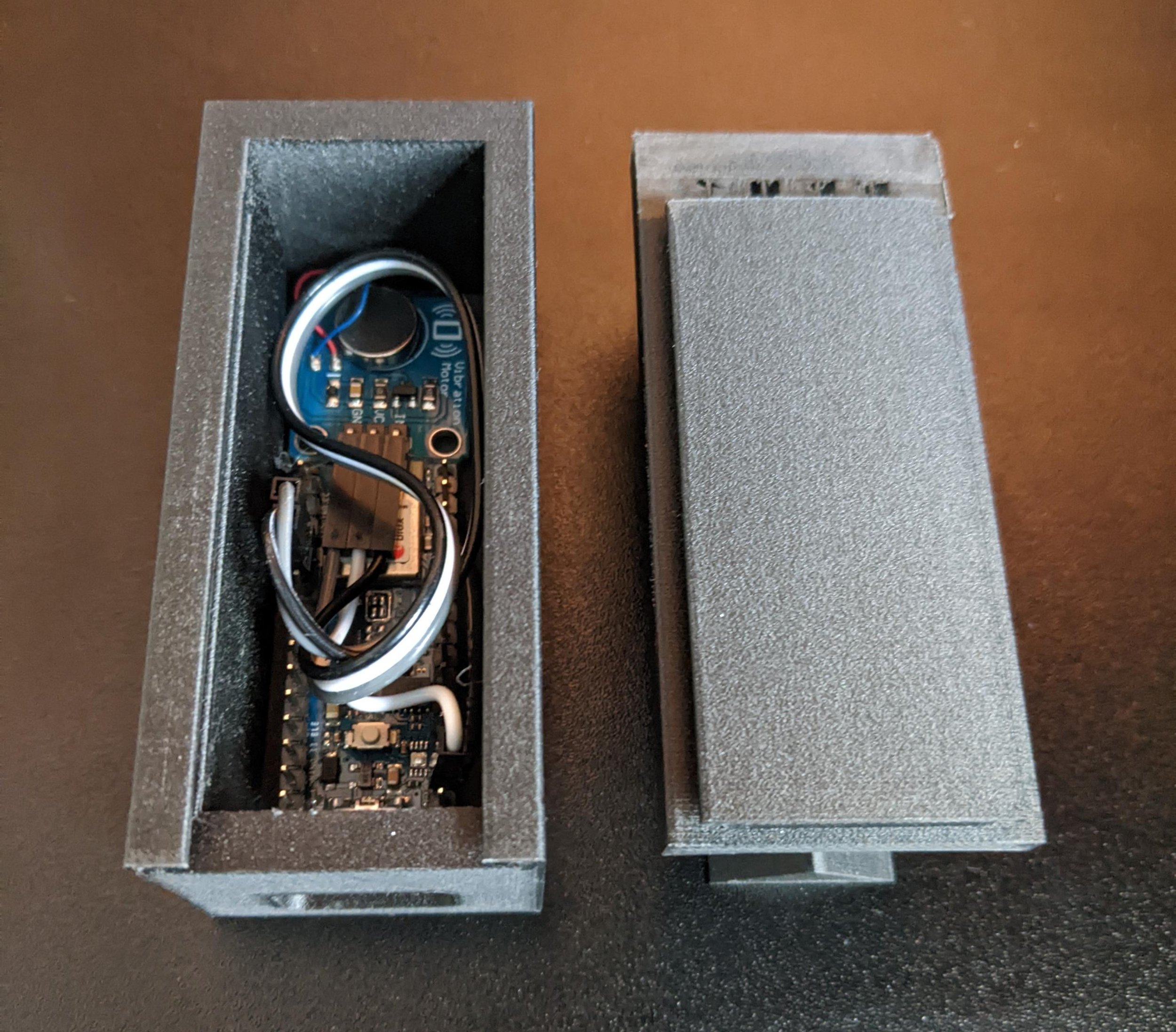 Interior of the custom game controller - revealing the Arduino 33 Nano BLE and Vibration Module