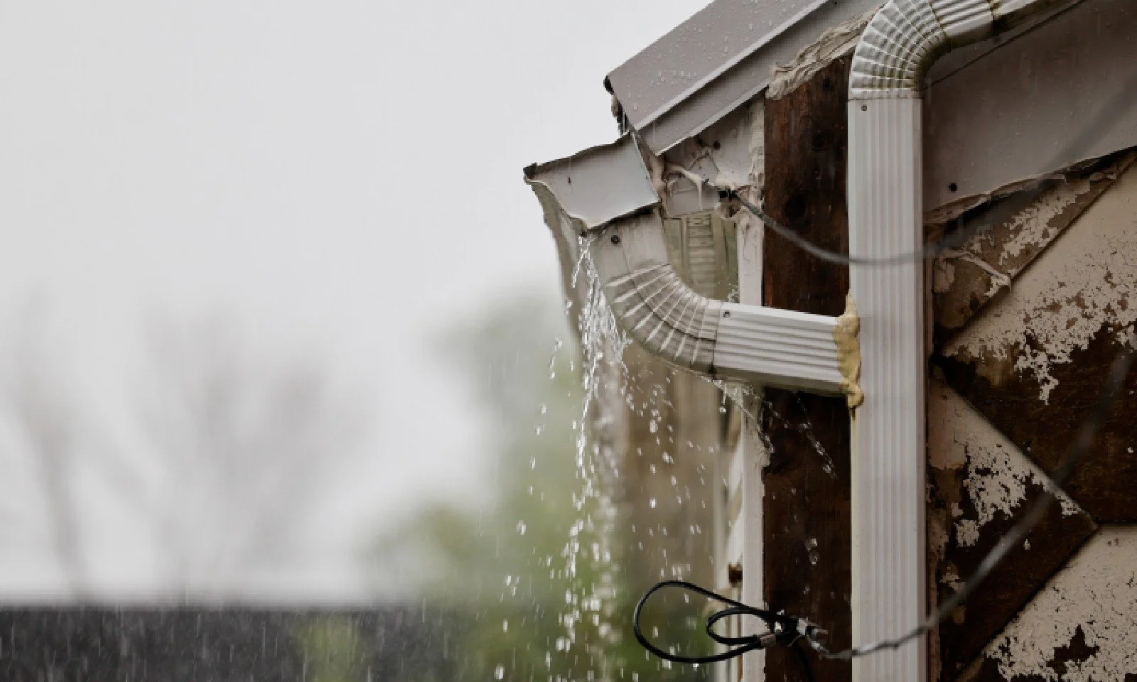 Downspouts &amp; Gutter Drainage: Preventing Wet Basements