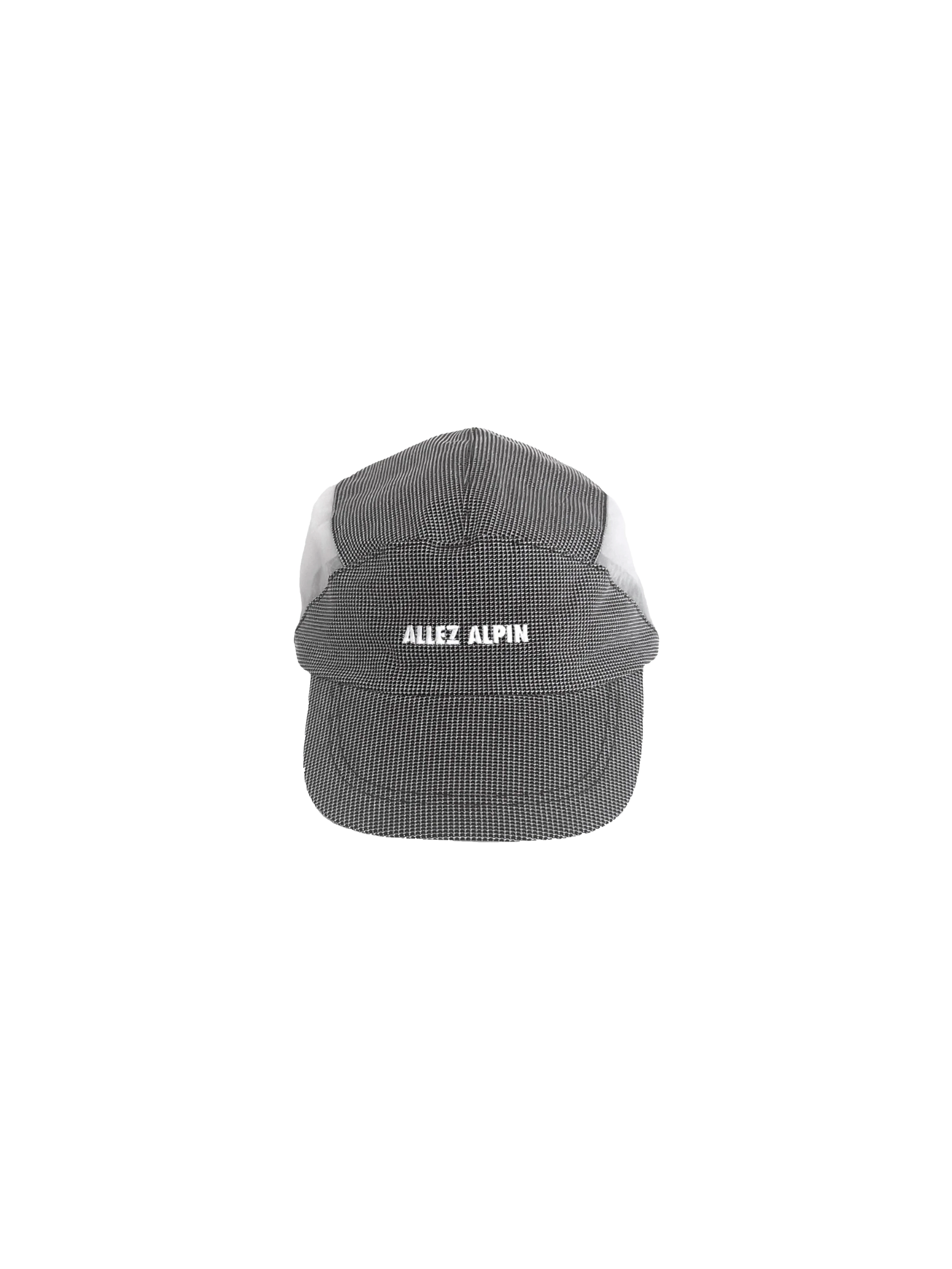 A black and white baseball cap with the words "ALLEZ ALPIN" embroidered on the front, placed on a white surface against a black background.