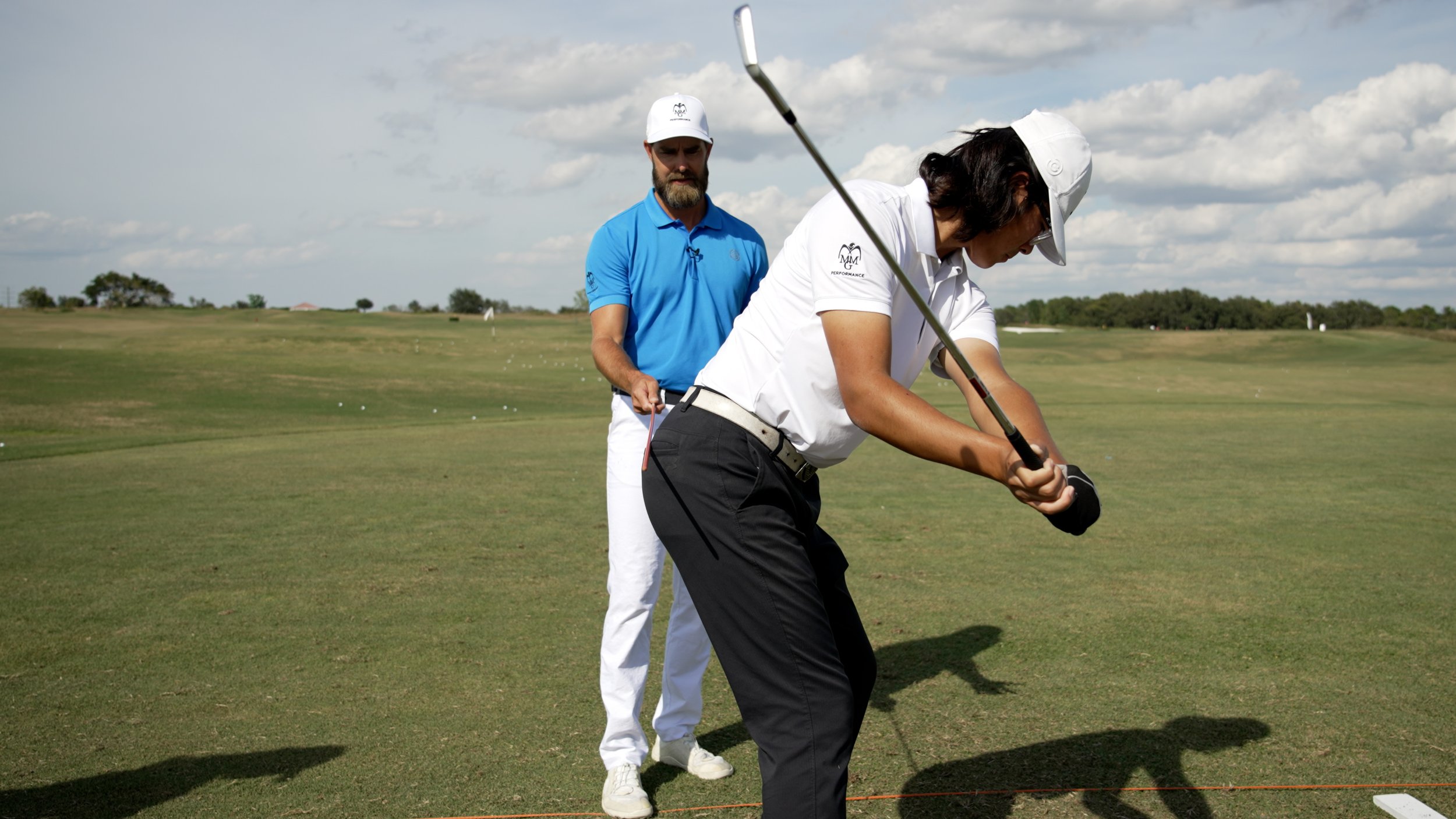 Junior golfer coaching session MMG Performance summer camp Florida