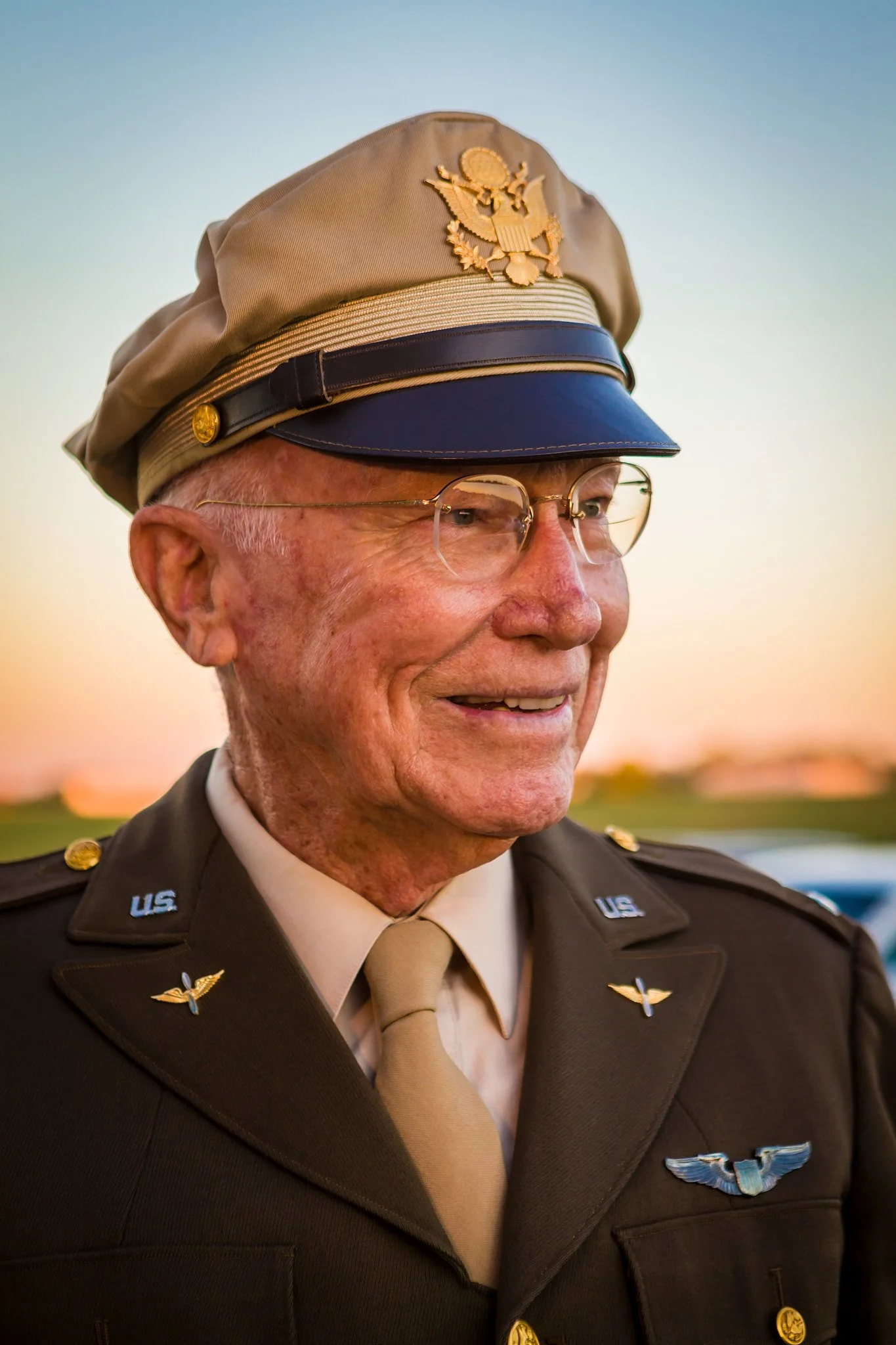 Ray Bell, a P-38 fighter pilot in WWII. Shown wearing his original "pinks and greens" uniform.  Created with natural light as the sunlight faded in Lawrenceville, Georgia.