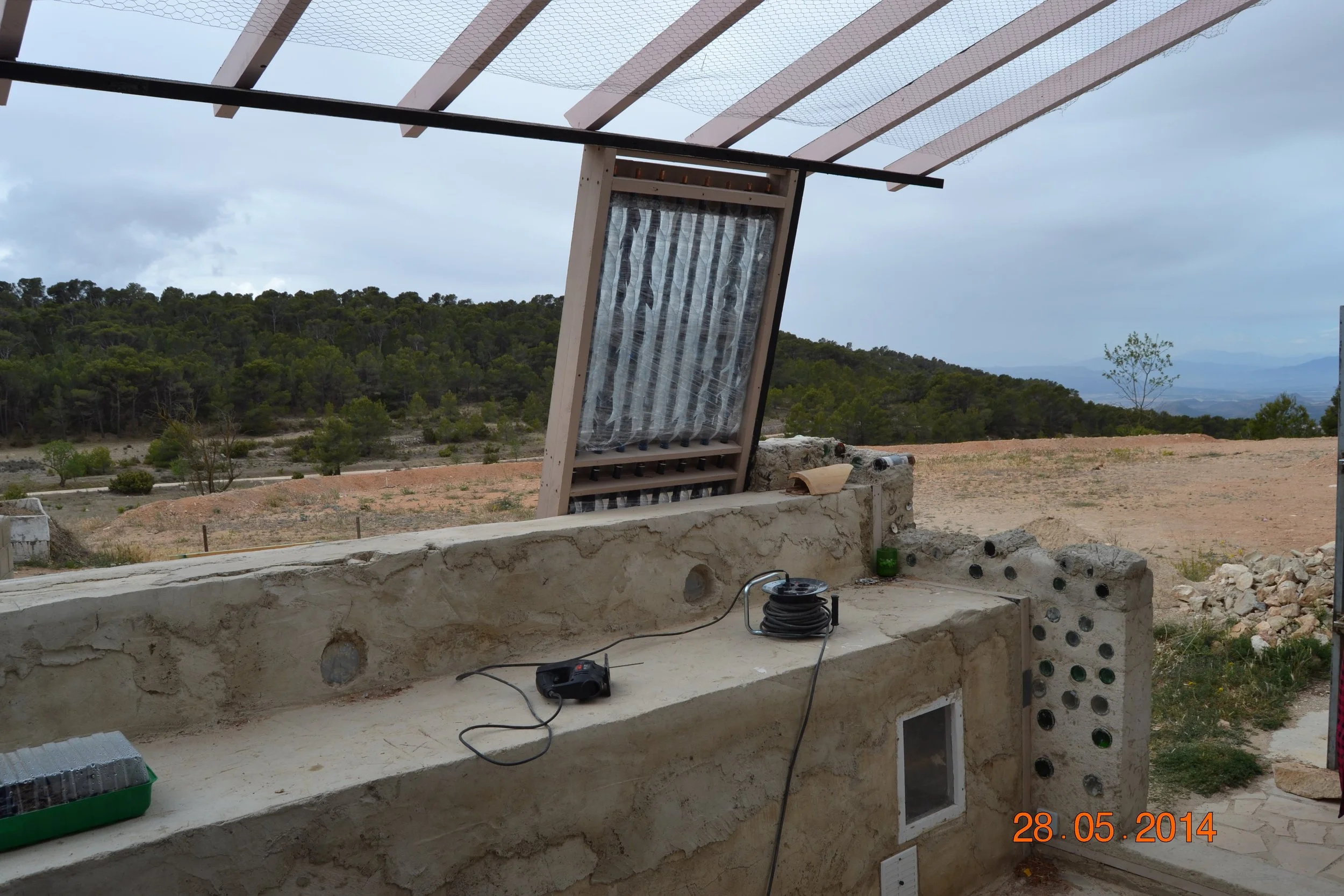 The Earthship greenhouse under construction