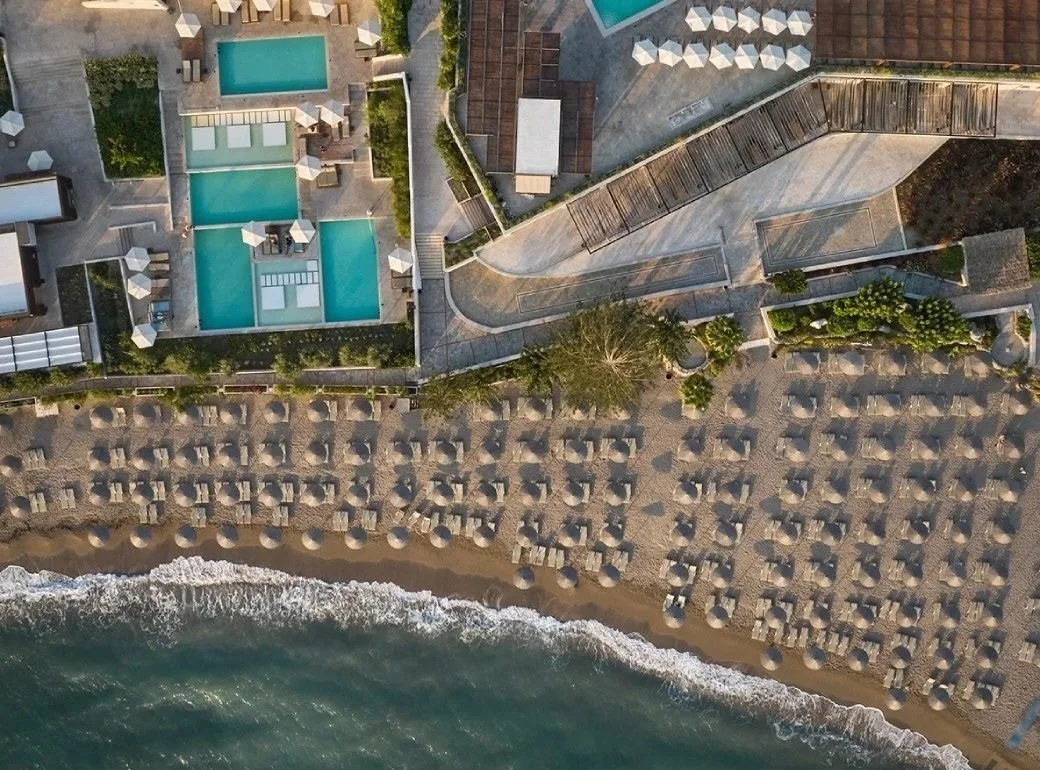 er_rho_helea_lifestyle_aerial_main_pool_beach-1.jpg