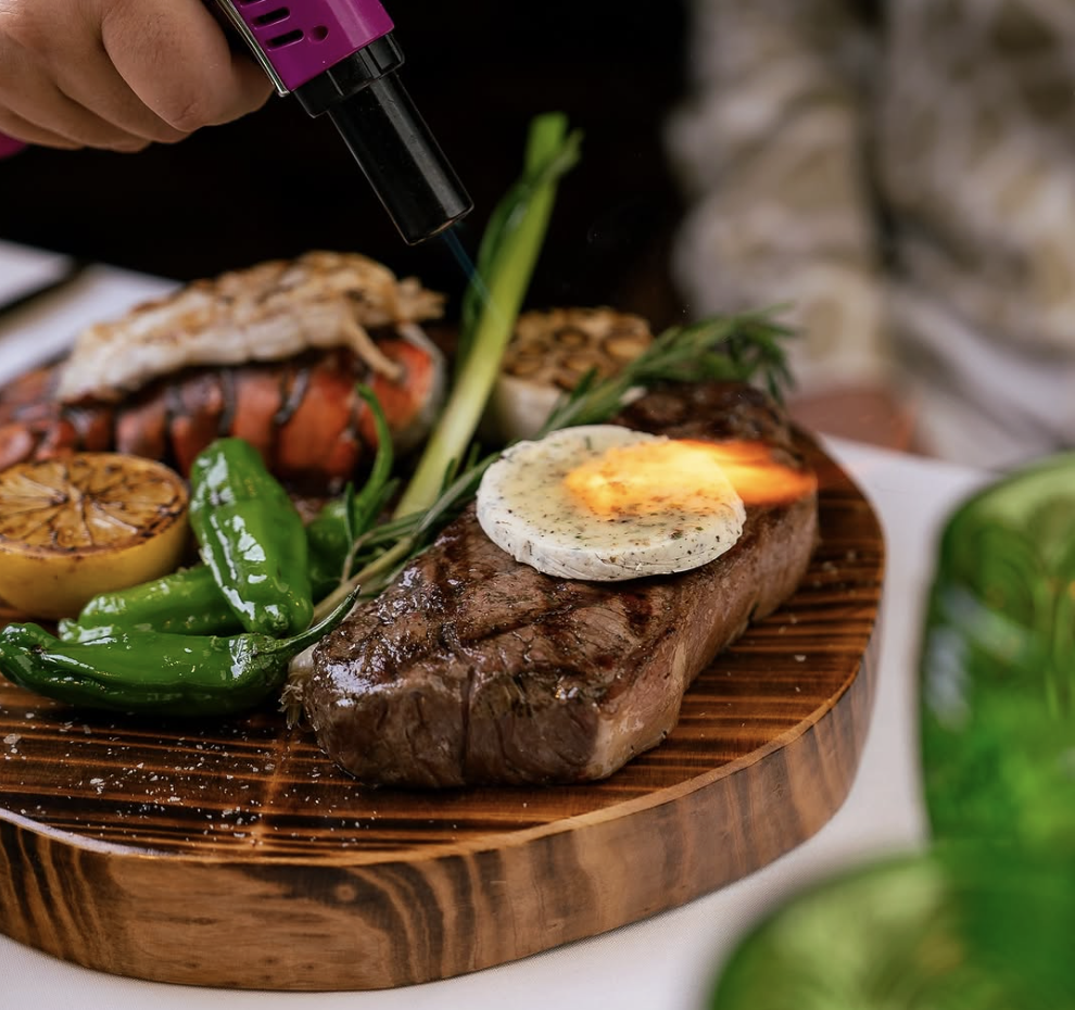 NY Strip with Herb Butter Sauce