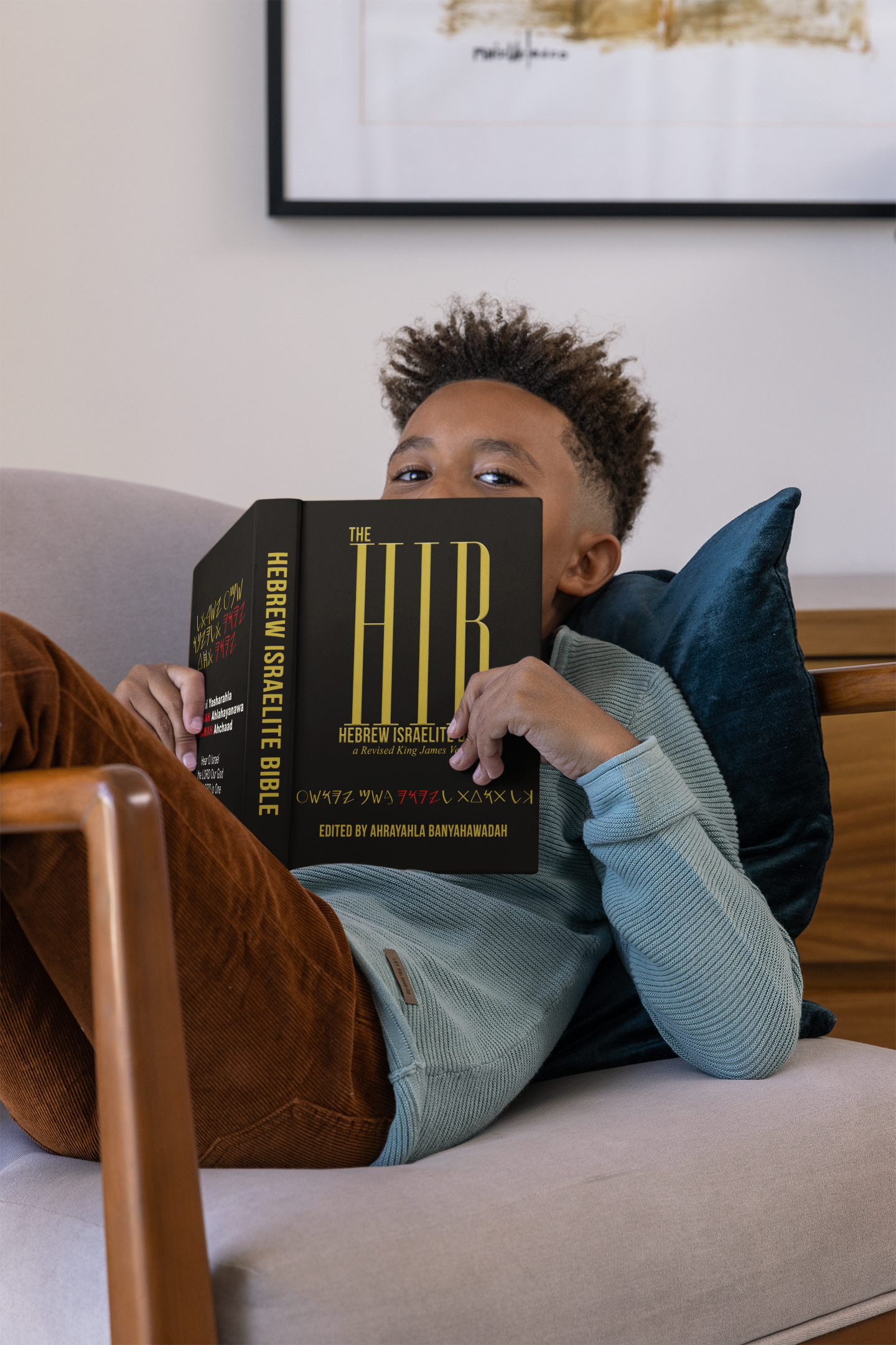 mockup-of-a-boy-chilling-with-a-book-at-home-m26942.png