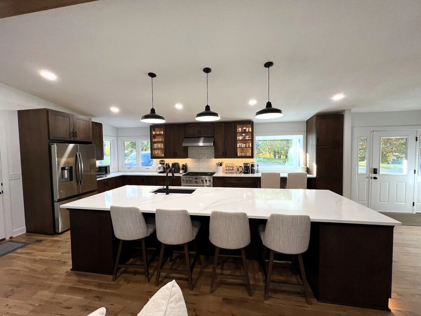 Before &rarr; After

This project began under difficult circumstances. After a house fire left most of the interior destroyed, the home was taken down to the studs and rebuilt from the ground up.

From there, we had the opportunity to completely reim