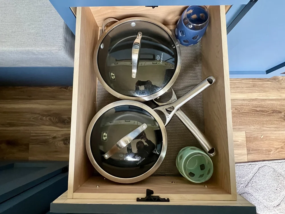  Drawer showing pots and pans in van camper kitchen 