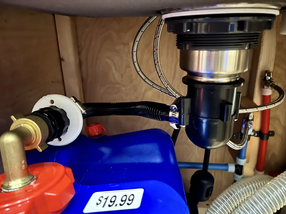 Camco drain to grey water jug