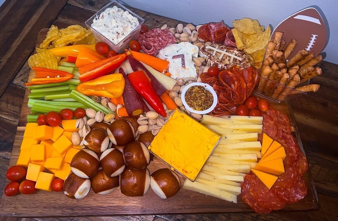 Game on! 🏈  Enjoy this winning charcuterie board during the Super Bowl! Visit beautyandthemeats.com to order yours