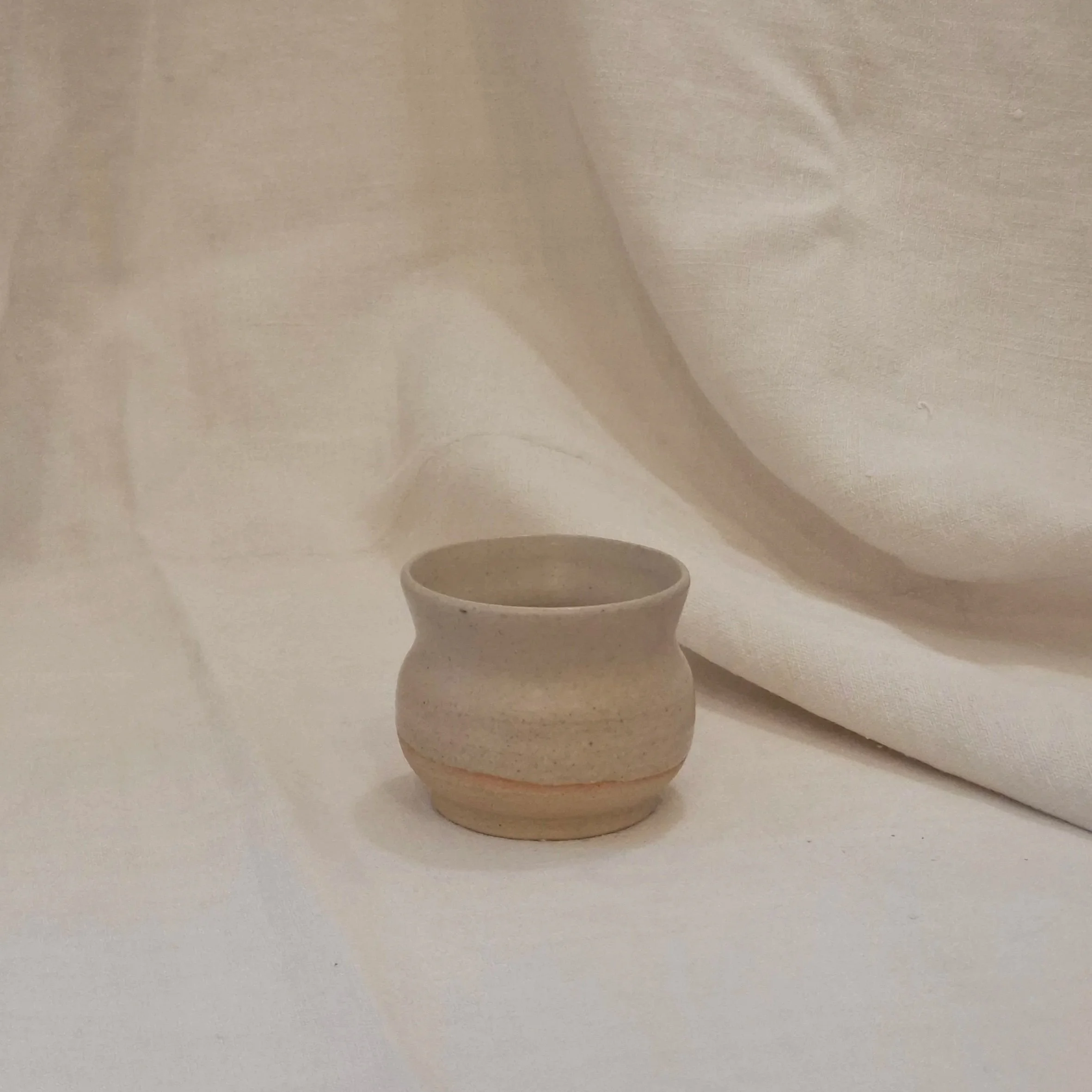 Sand stoneware small cup by Rita Zorro