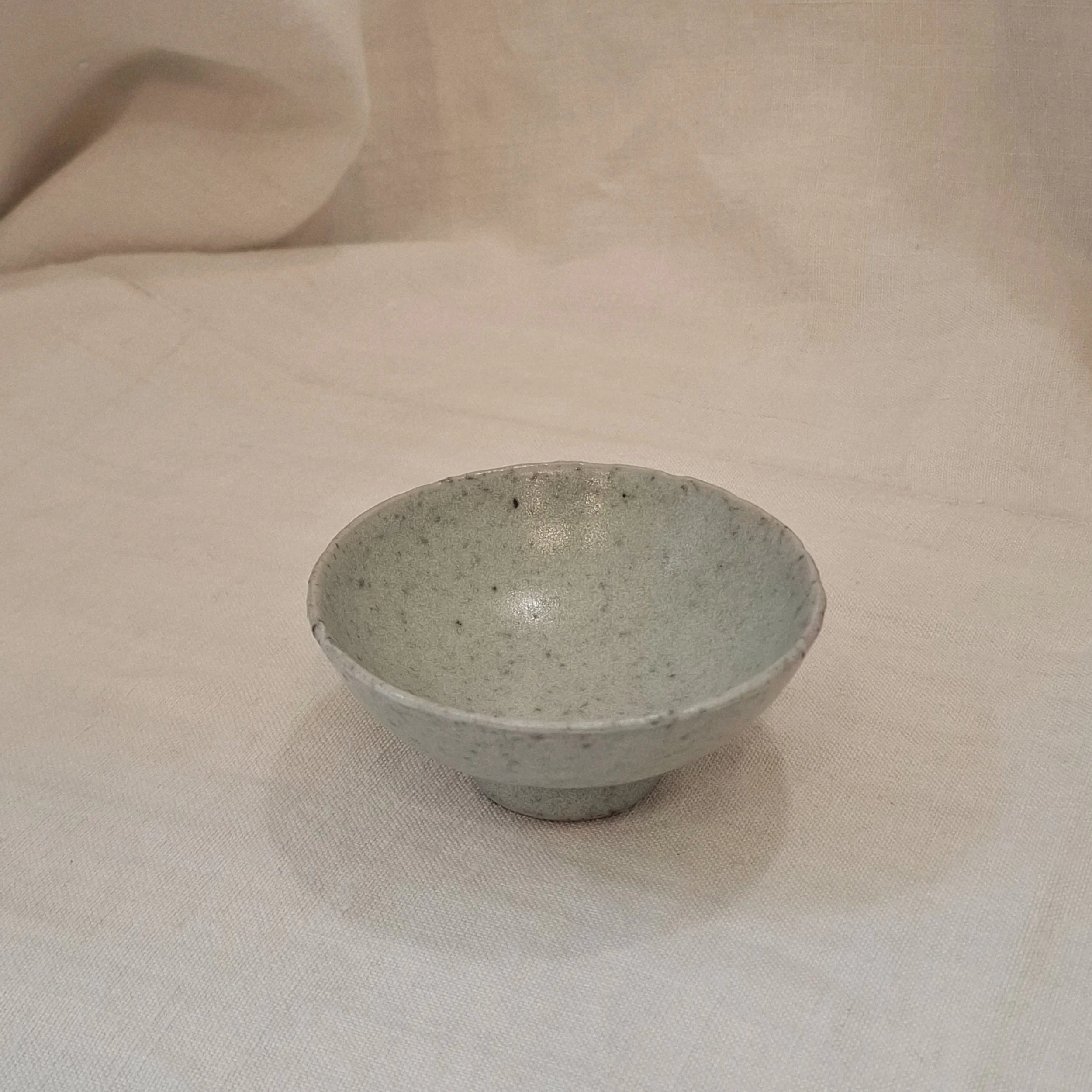 Light grey glazed stoneware mini bowl by Miguel Neto