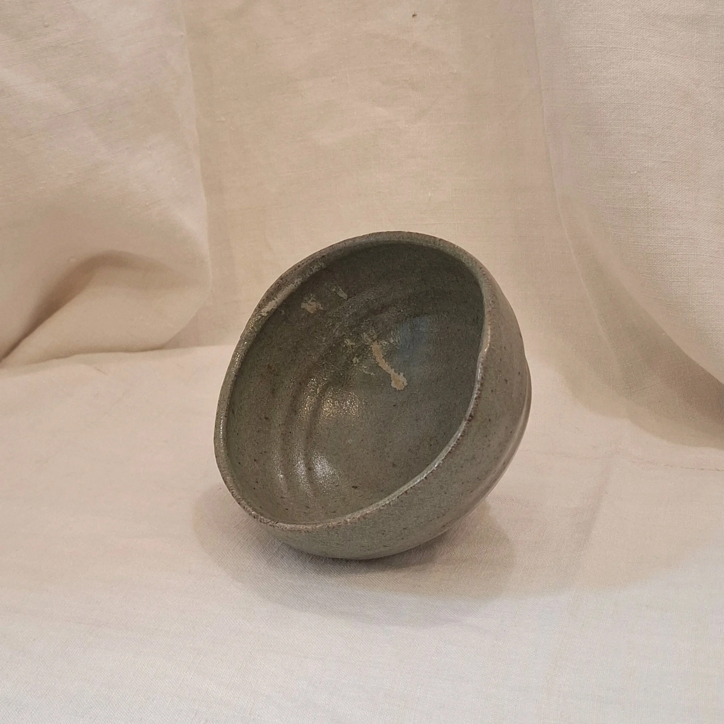 Green glazed stoneware bowl by Miguel Neto