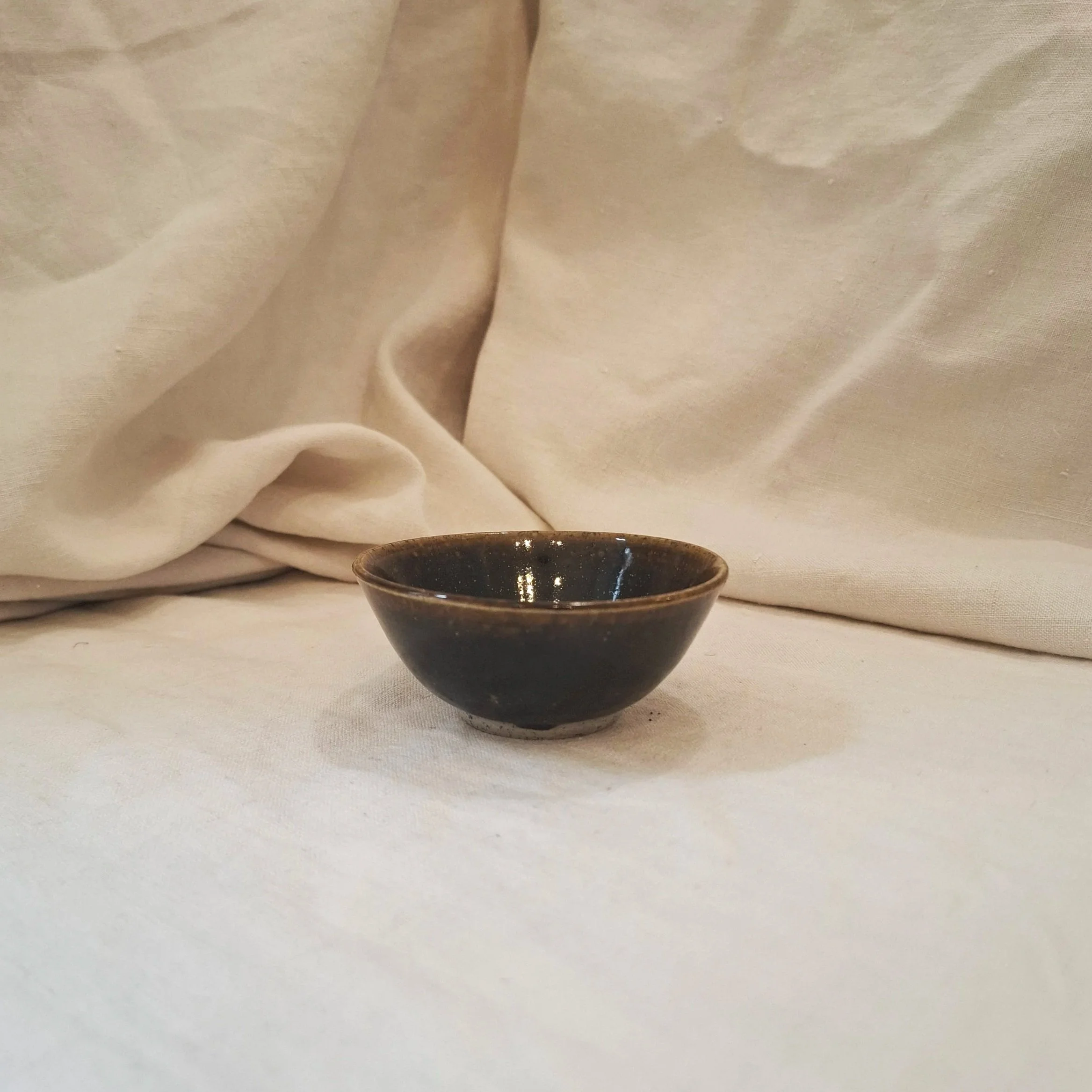 Forest green glazed stoneware mini bowl by Miguel Neto
