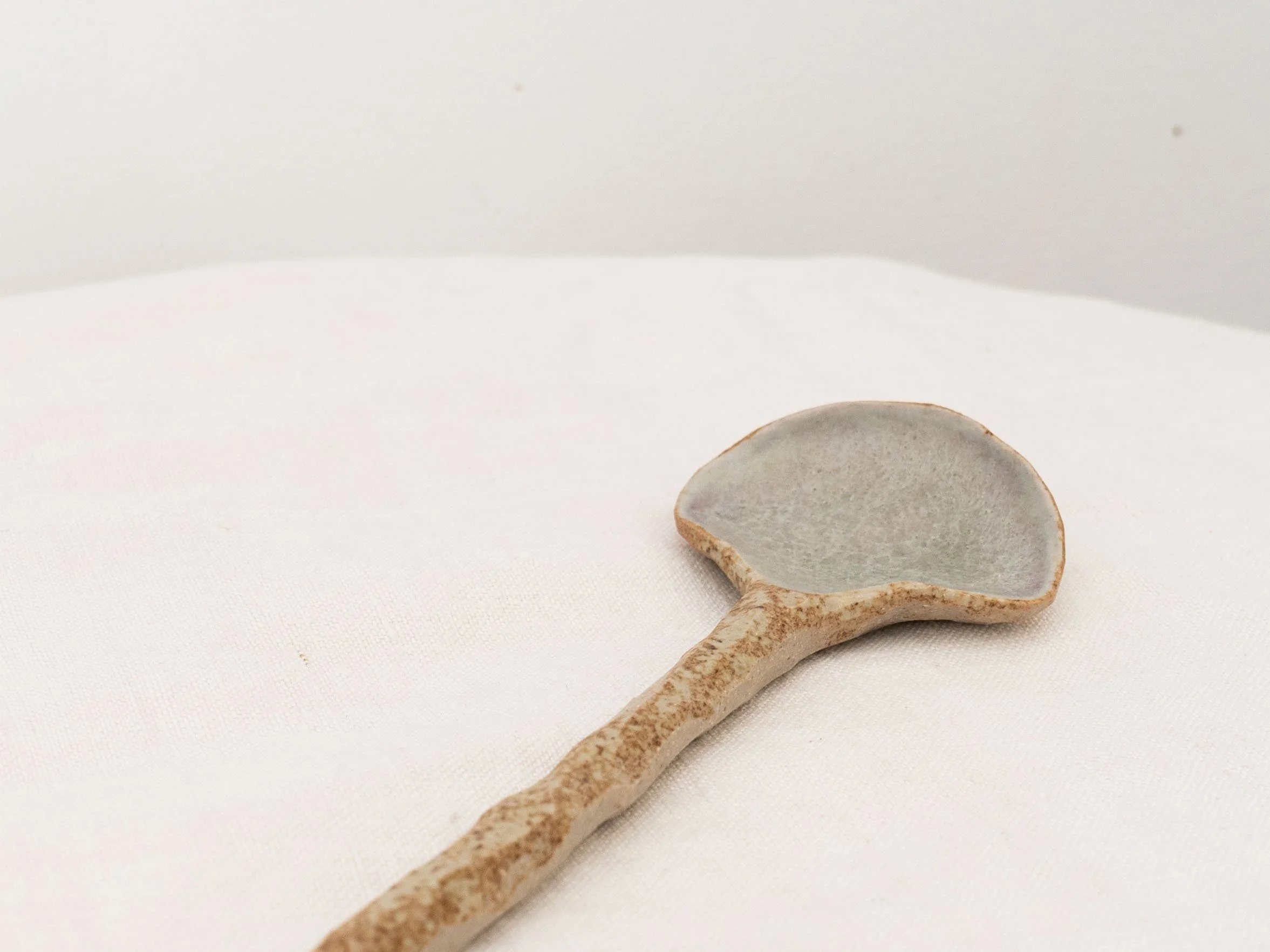Light sage green ceramic spoon by A Galaricha