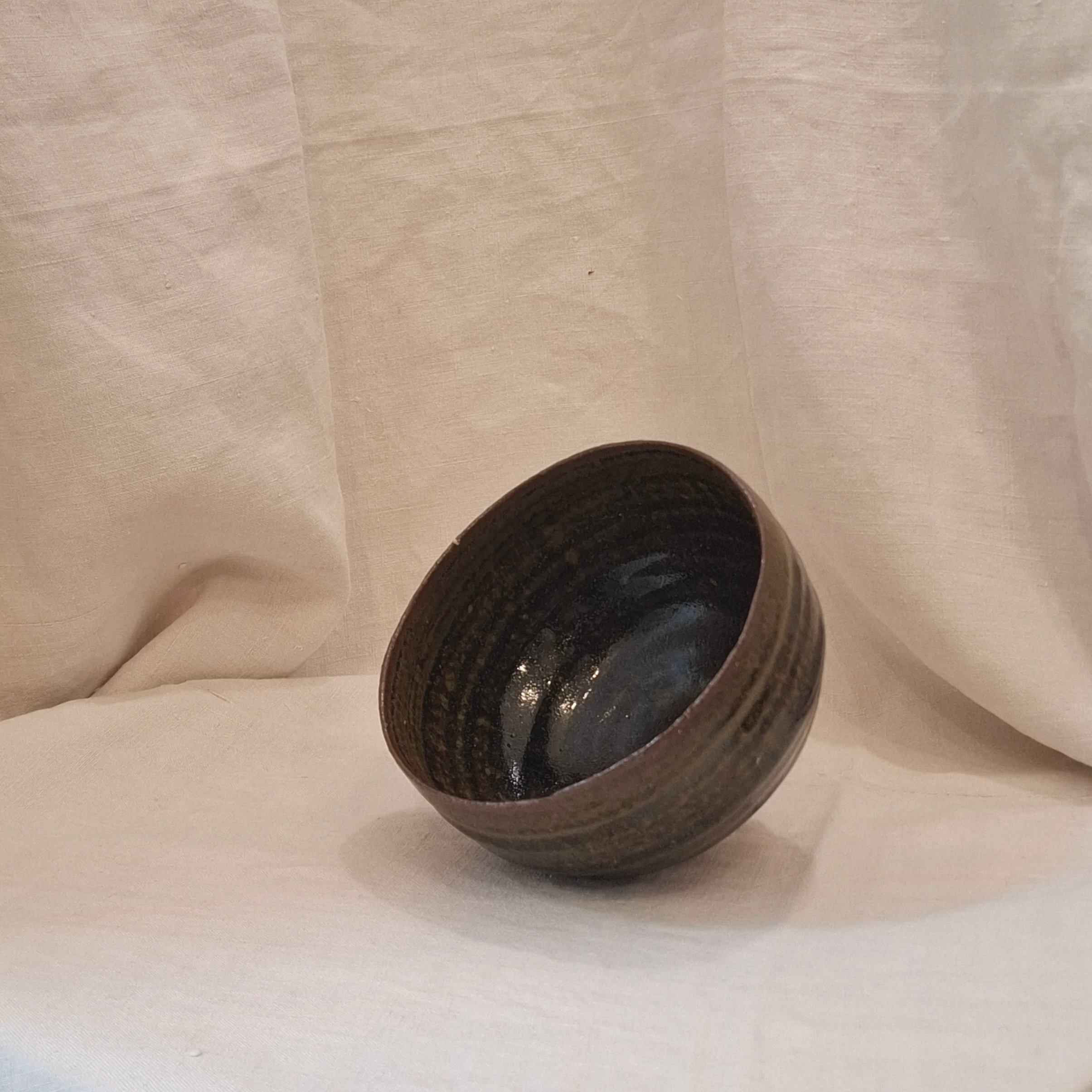 Forest green glazed stoneware bowl by Miguel Neto