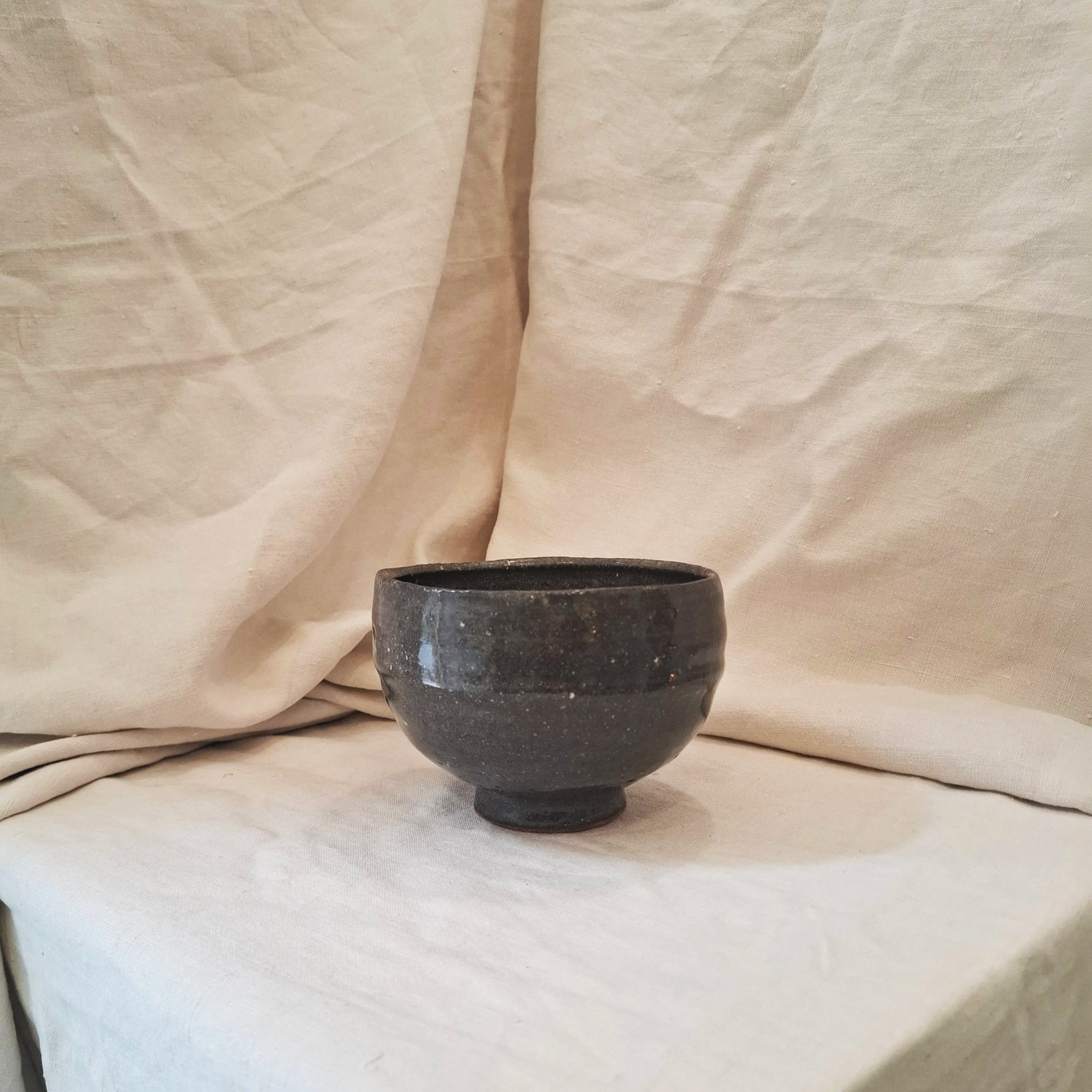 Dark grey glazed stoneware bowl by Miguel Neto