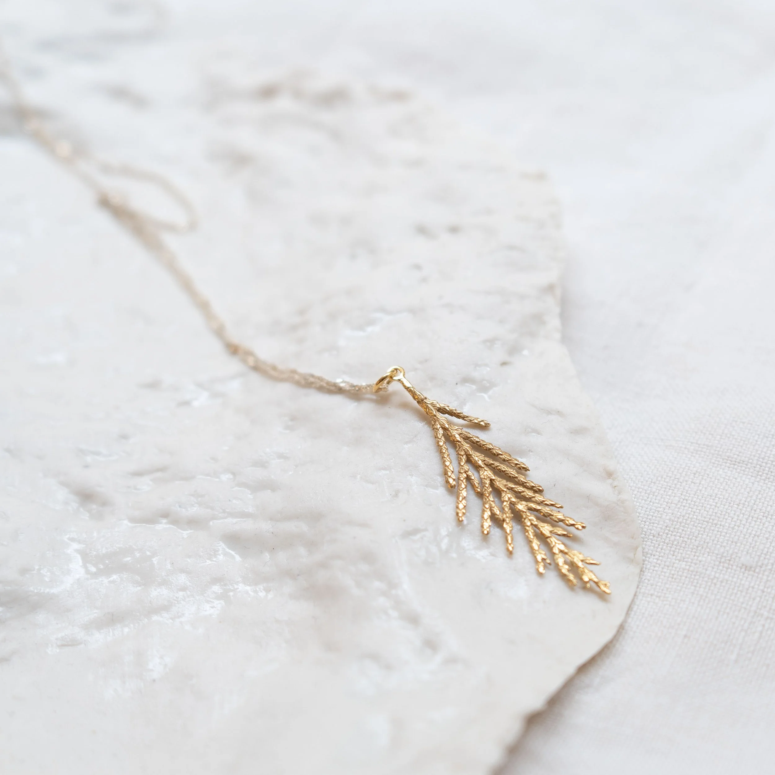 Gold plated silver Cedar leaf necklace by Amuleto