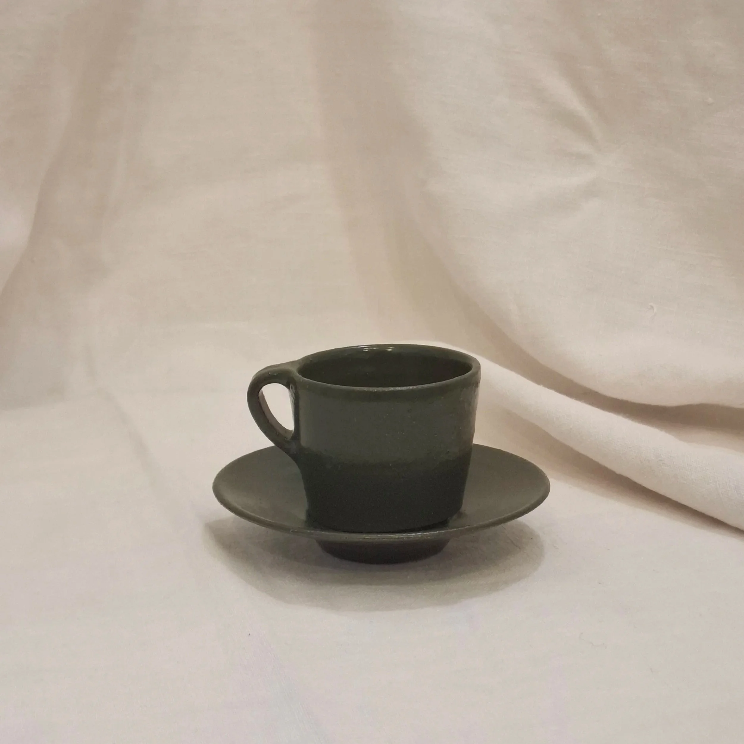 Green glazed stoneware coffee set by Rita Zorro