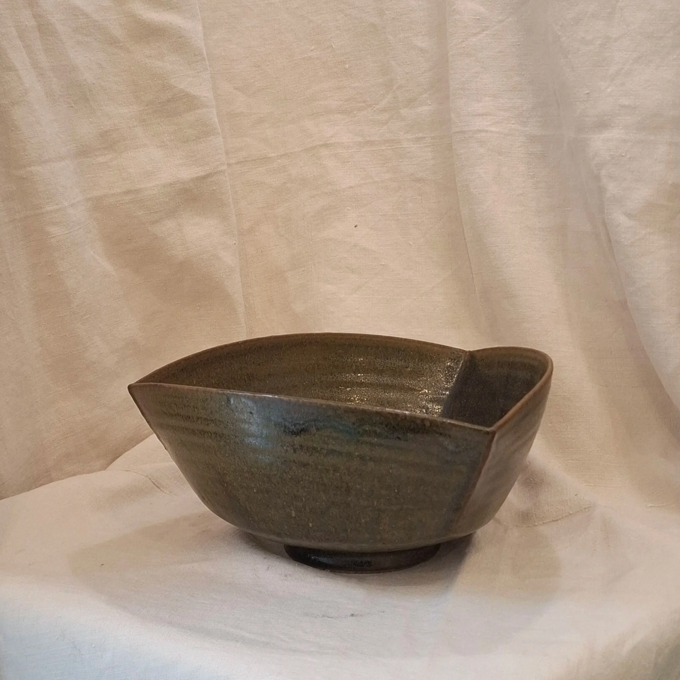 Forest green glazed stoneware bowl by Miguel Neto