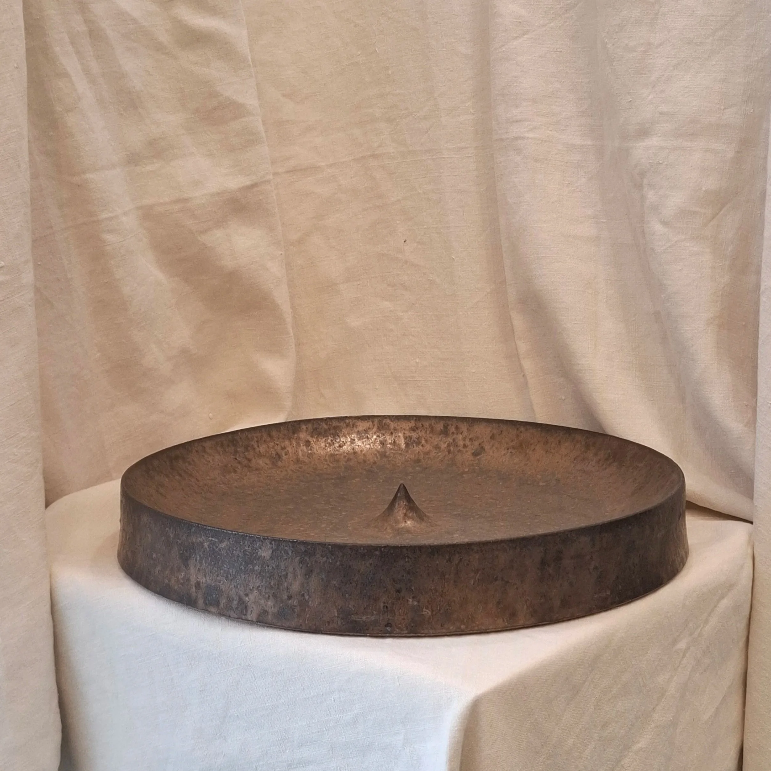 Copper glazed stoneware plate by Miguel Neto